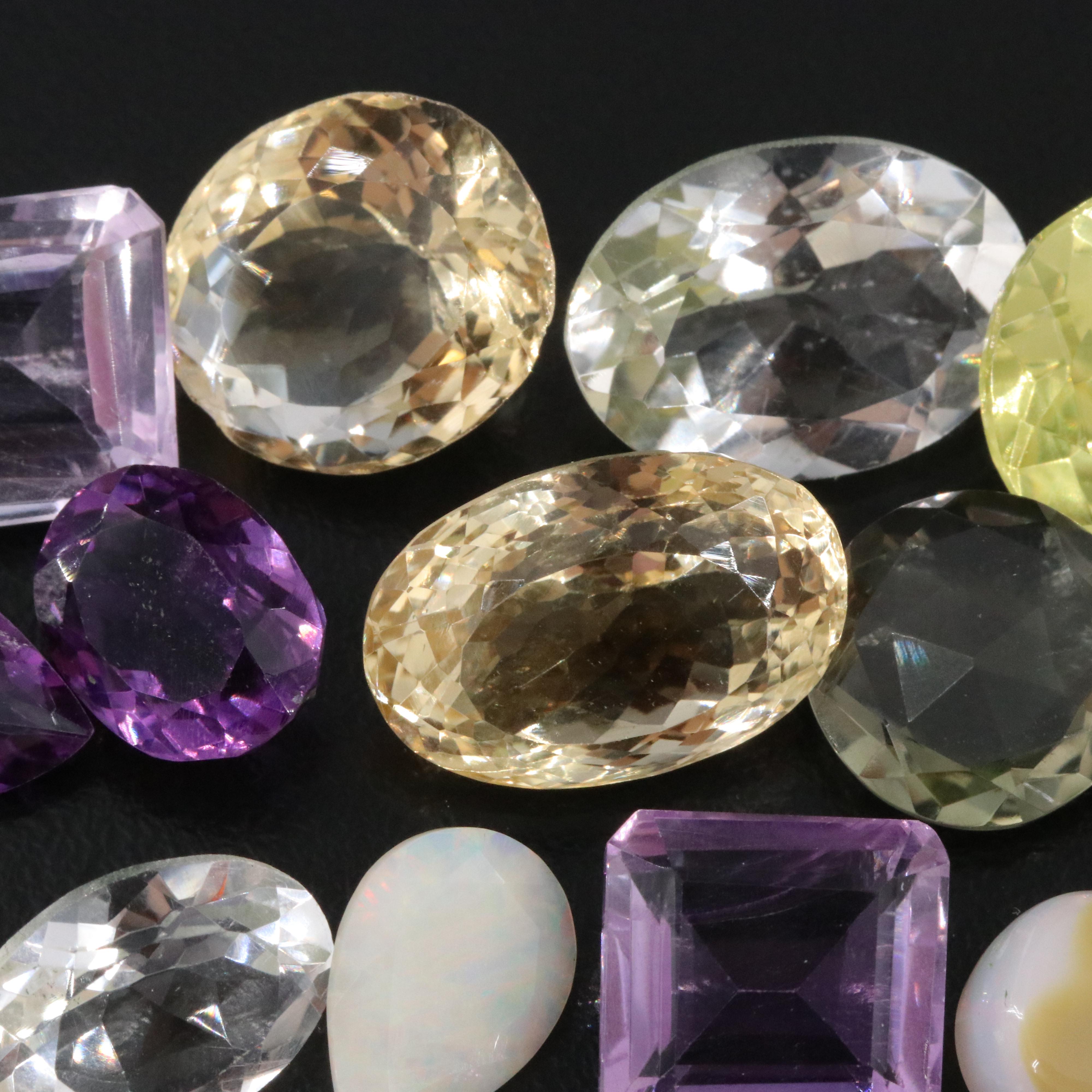 Loose 173.73 CTW Gemstone Lot Including Opal, Amethyst and Garnet