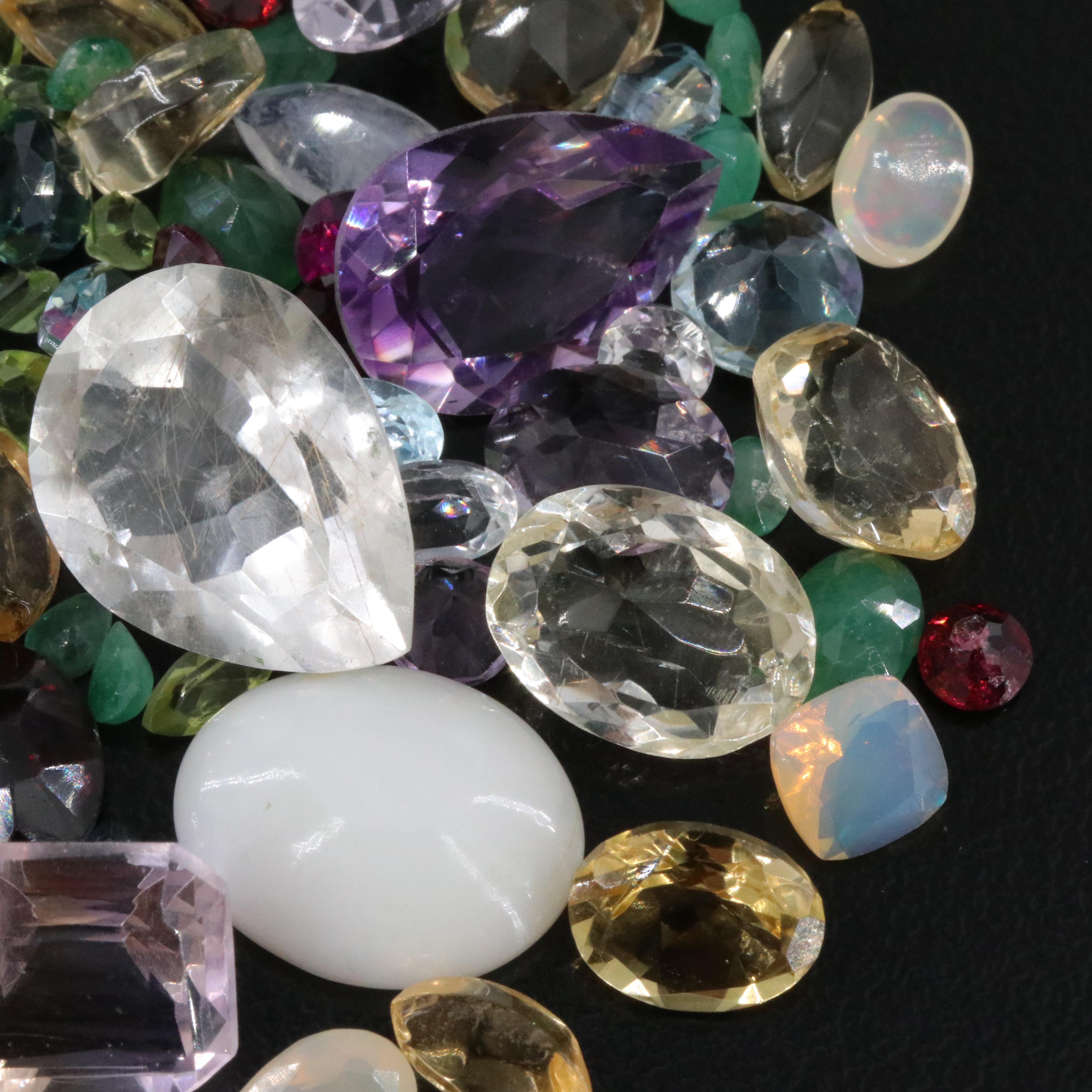 Loose 109.92 CTW Gemstone Lot Including Rainbow Moonstone, Amethyst and Emerald