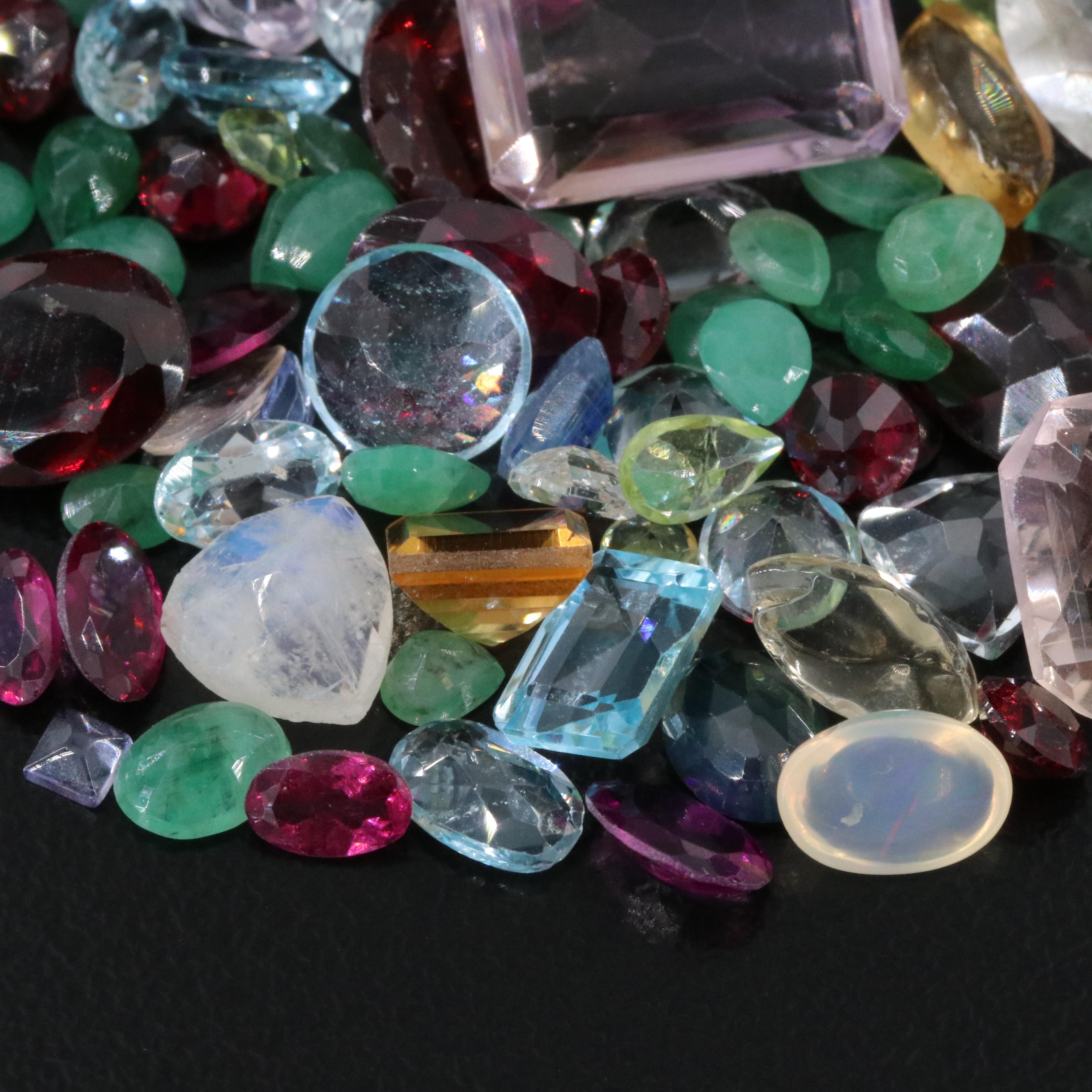 Loose 109.92 CTW Gemstone Lot Including Rainbow Moonstone, Amethyst and Emerald