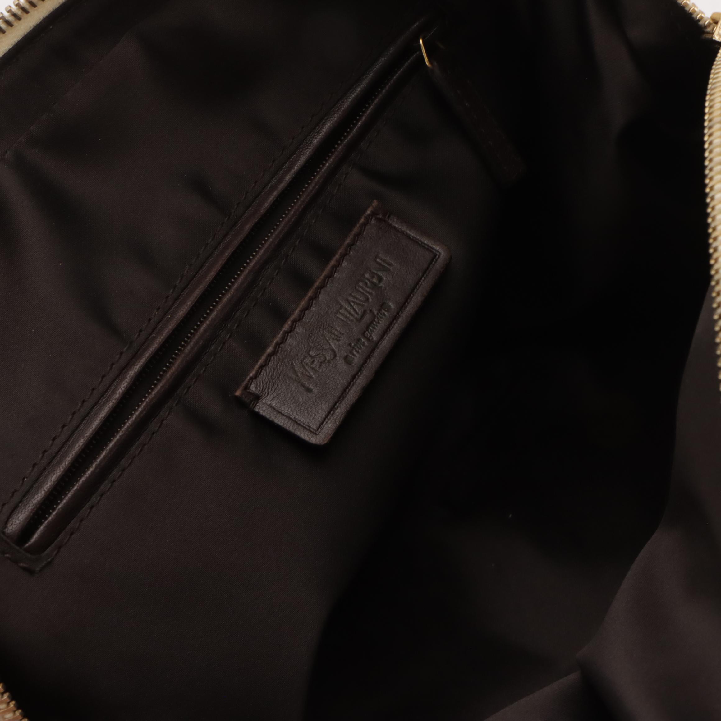 Yves Saint Laurent Domed Muse Handbag in Ivory Calfskin  Leather