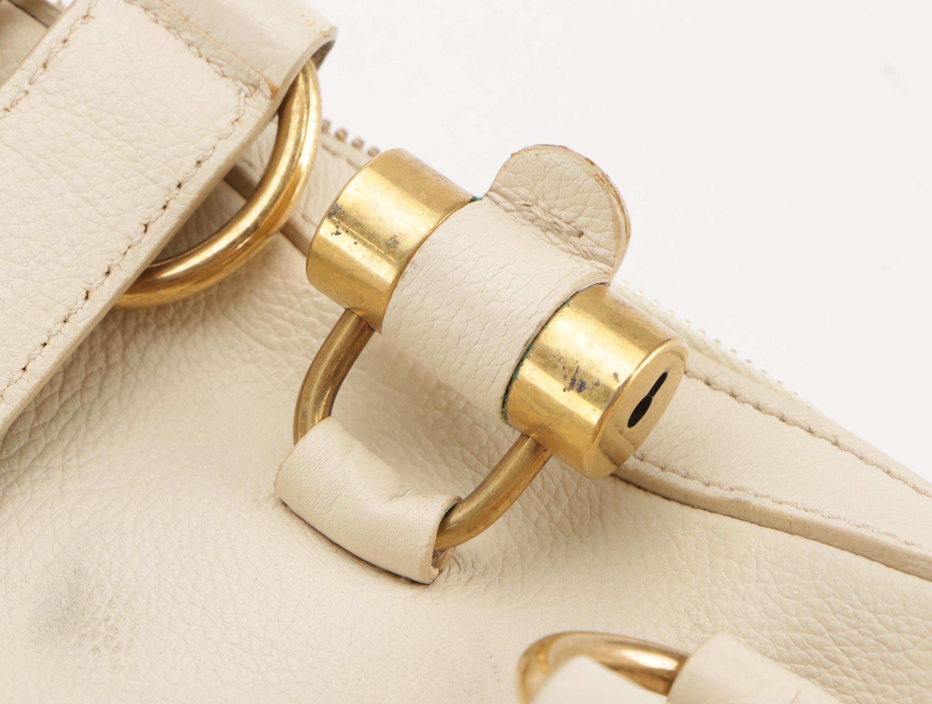 Yves Saint Laurent Domed Muse Handbag in Ivory Calfskin  Leather
