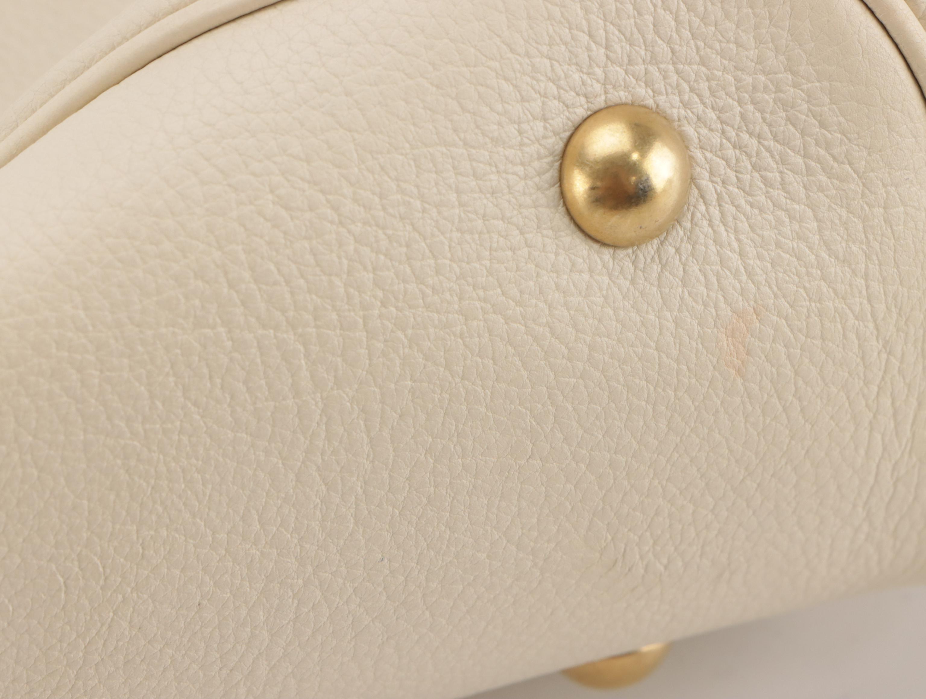 Yves Saint Laurent Domed Muse Handbag in Ivory Calfskin  Leather
