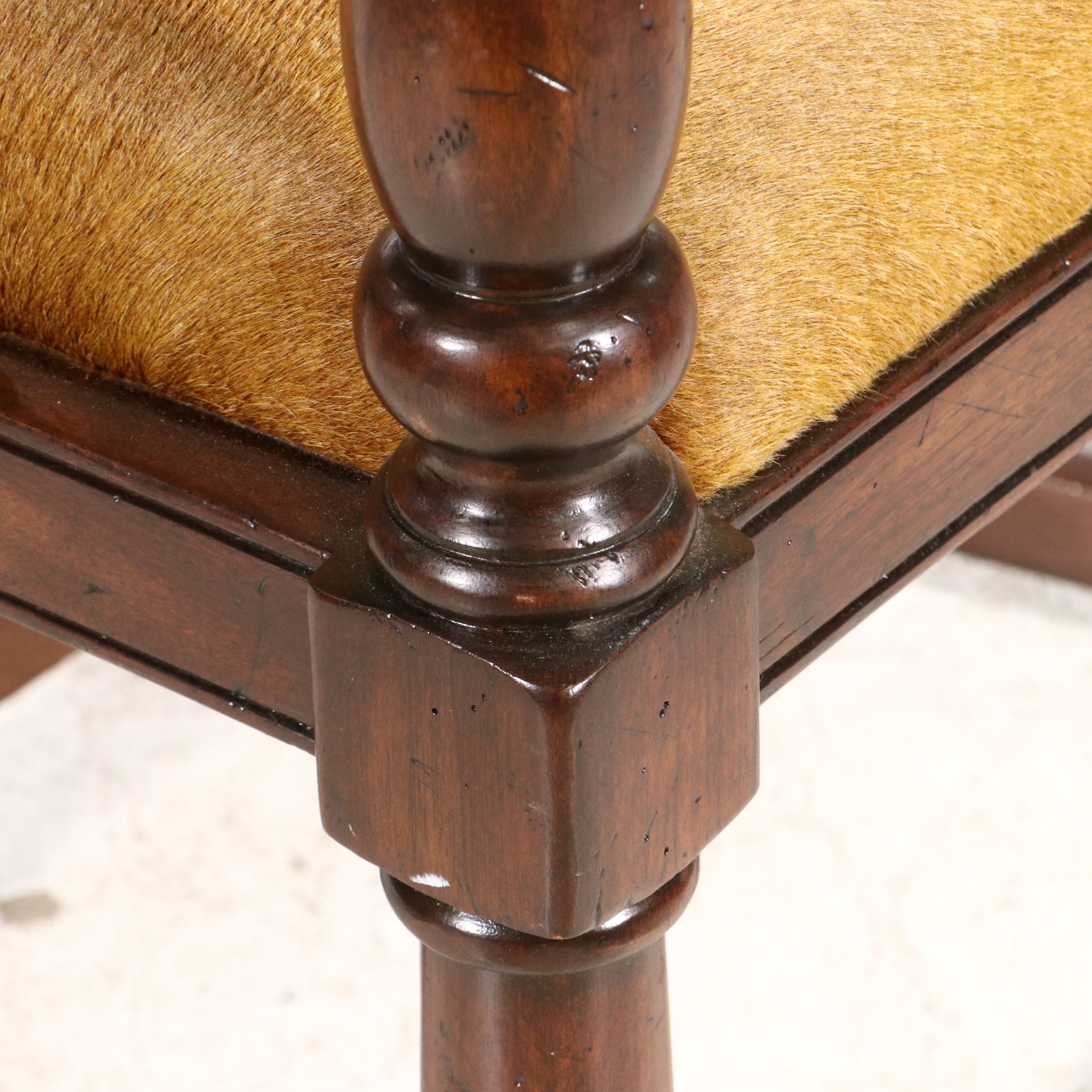 Gothic Revival Style Hide Upholstered and Mahogany Horseshoe Back Armchair