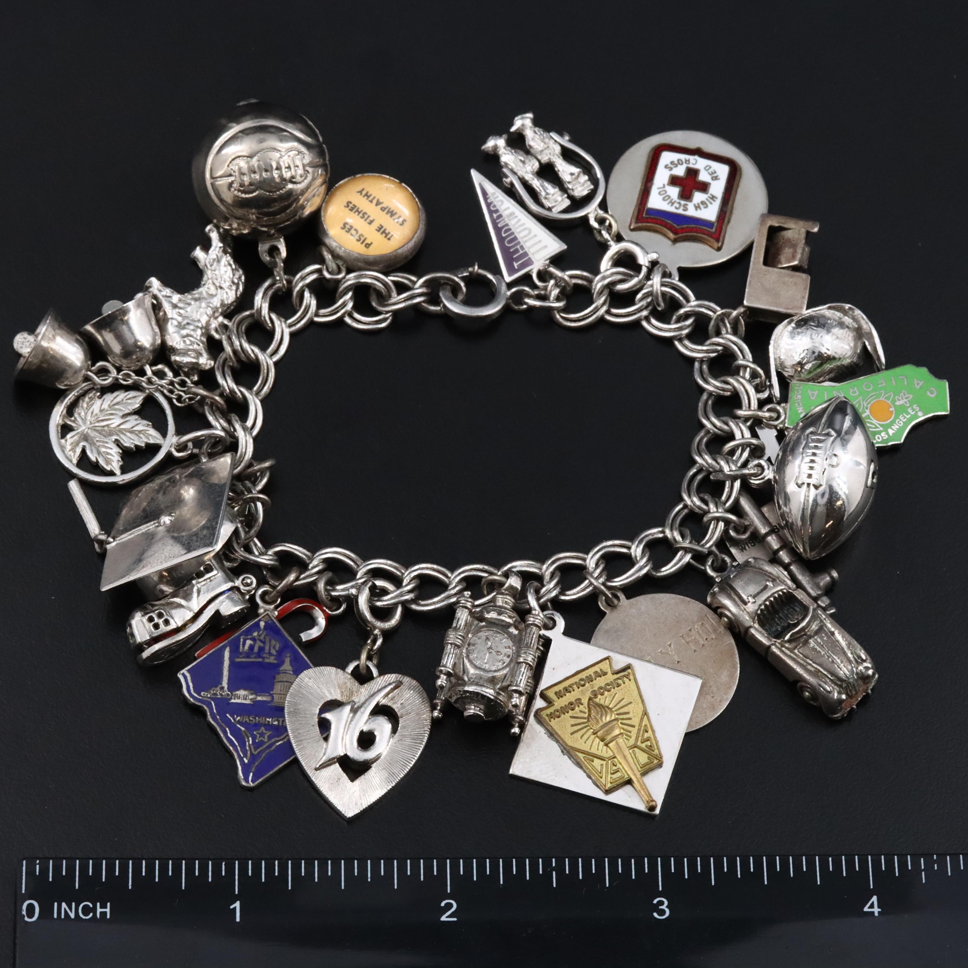 Vintage Charm Bracelet Including Sterling and Articulation