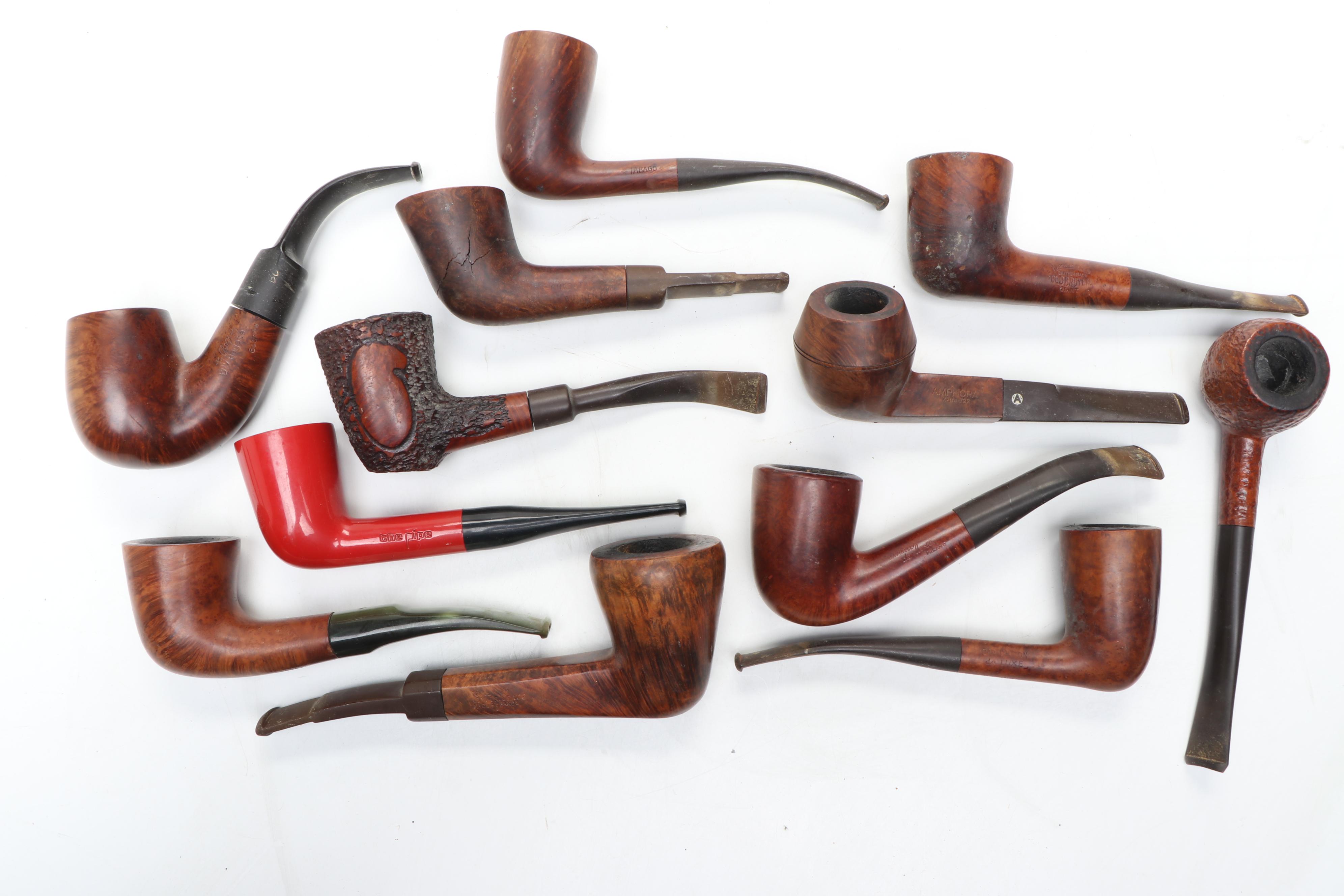 Butz-Choquin, Tabago, and More Carved Wood Pipes with Wooden Stand