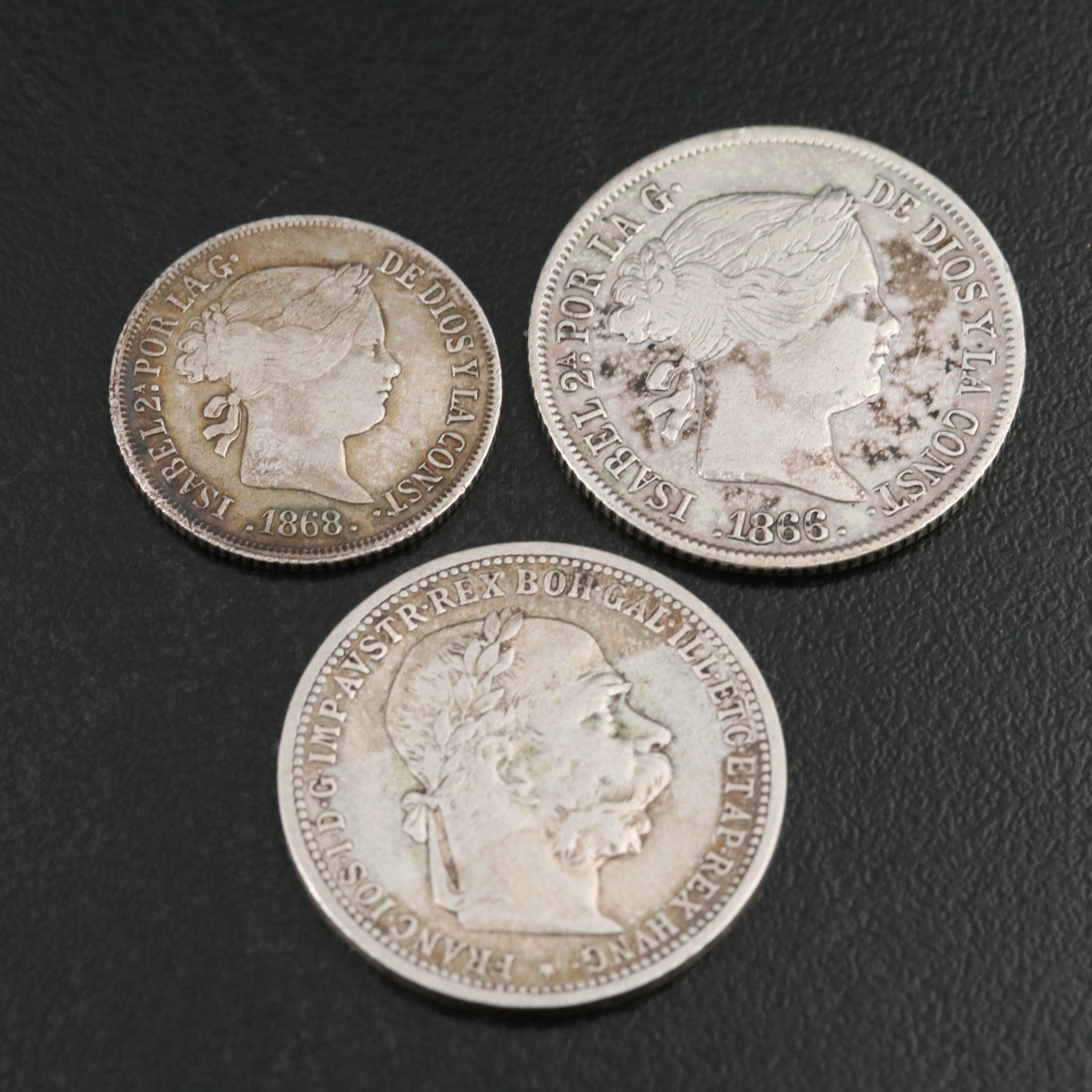 Seven Silver Foreign Coins Including an 1897 Sweden Silver 2 Kroner