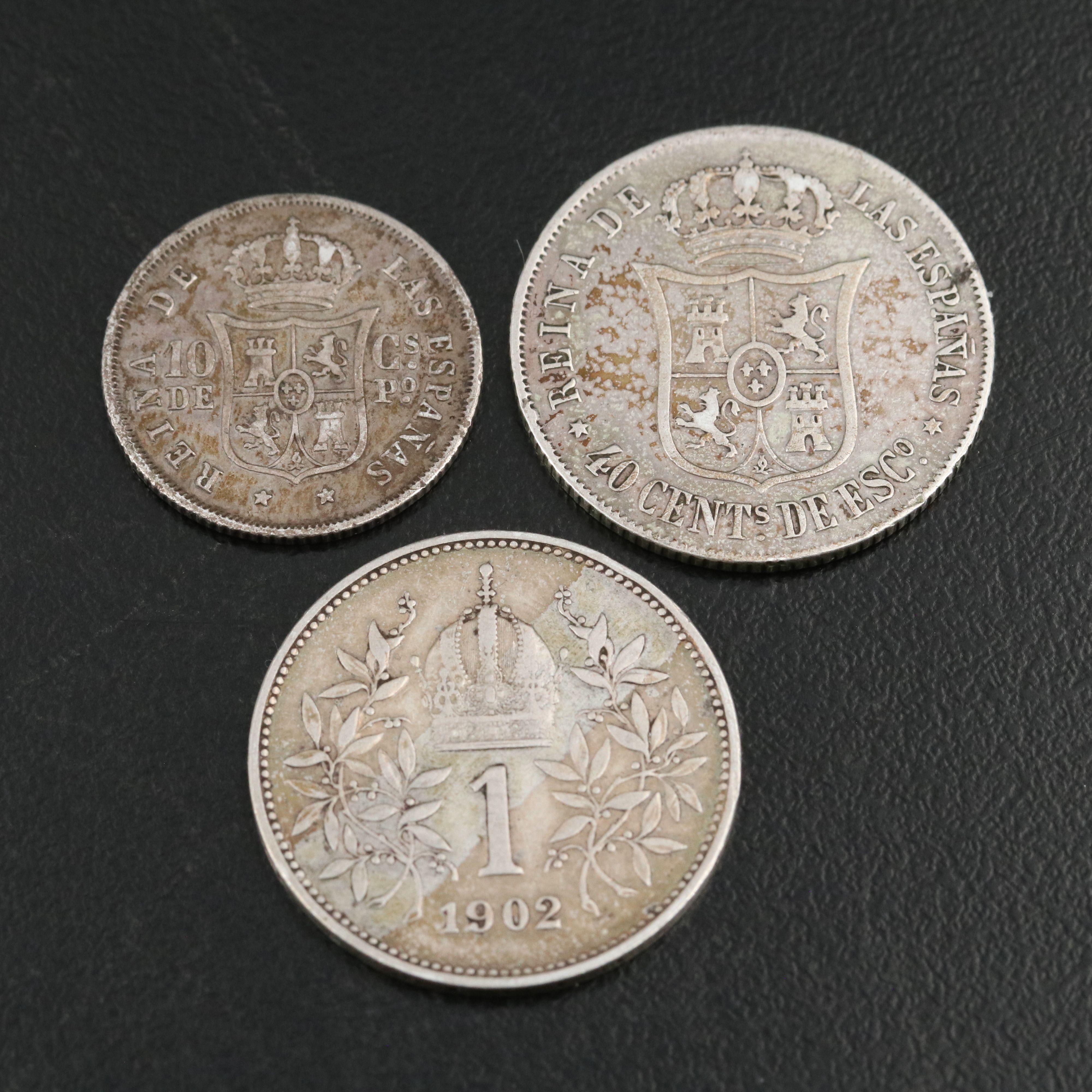 Seven Silver Foreign Coins Including an 1897 Sweden Silver 2 Kroner