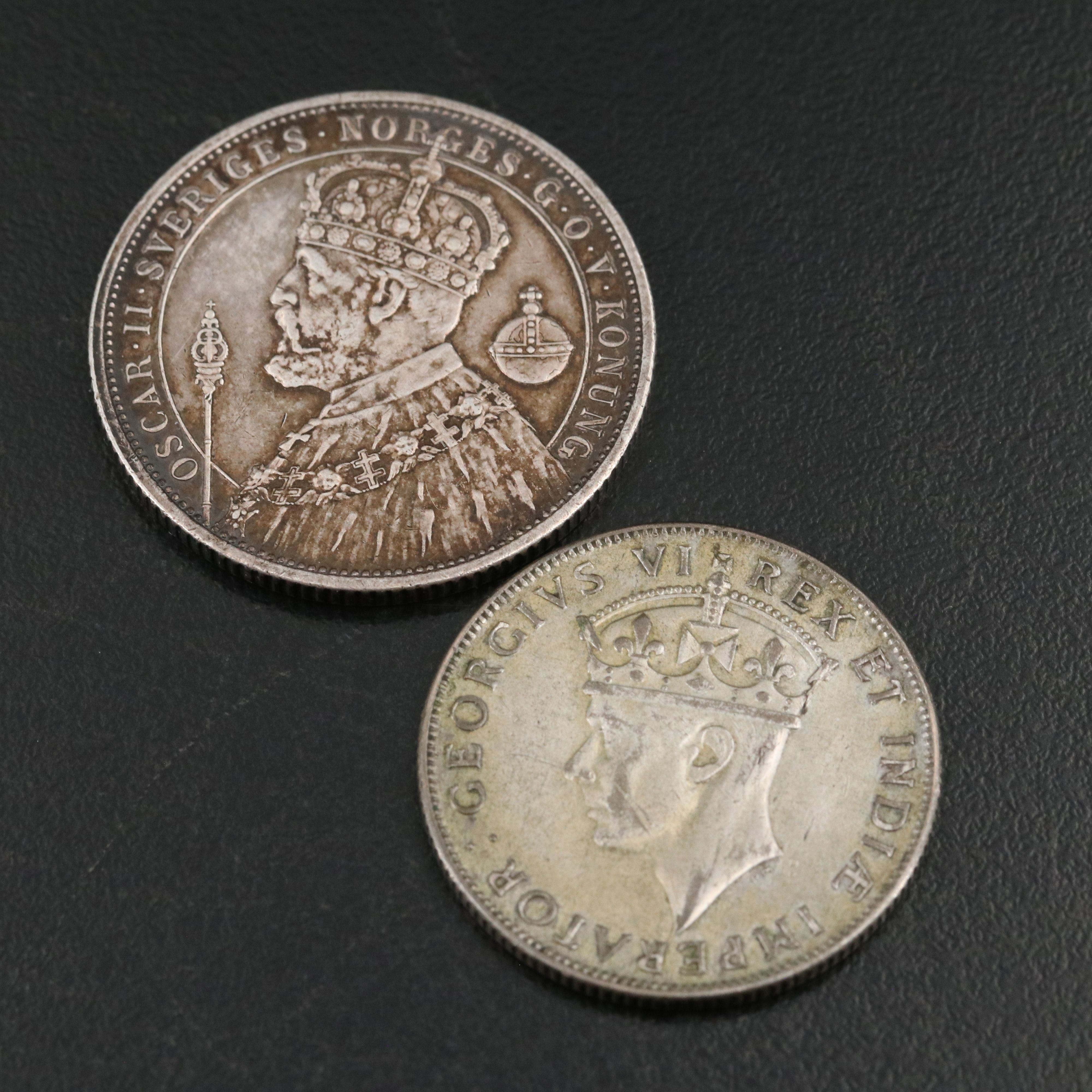 Seven Silver Foreign Coins Including an 1897 Sweden Silver 2 Kroner