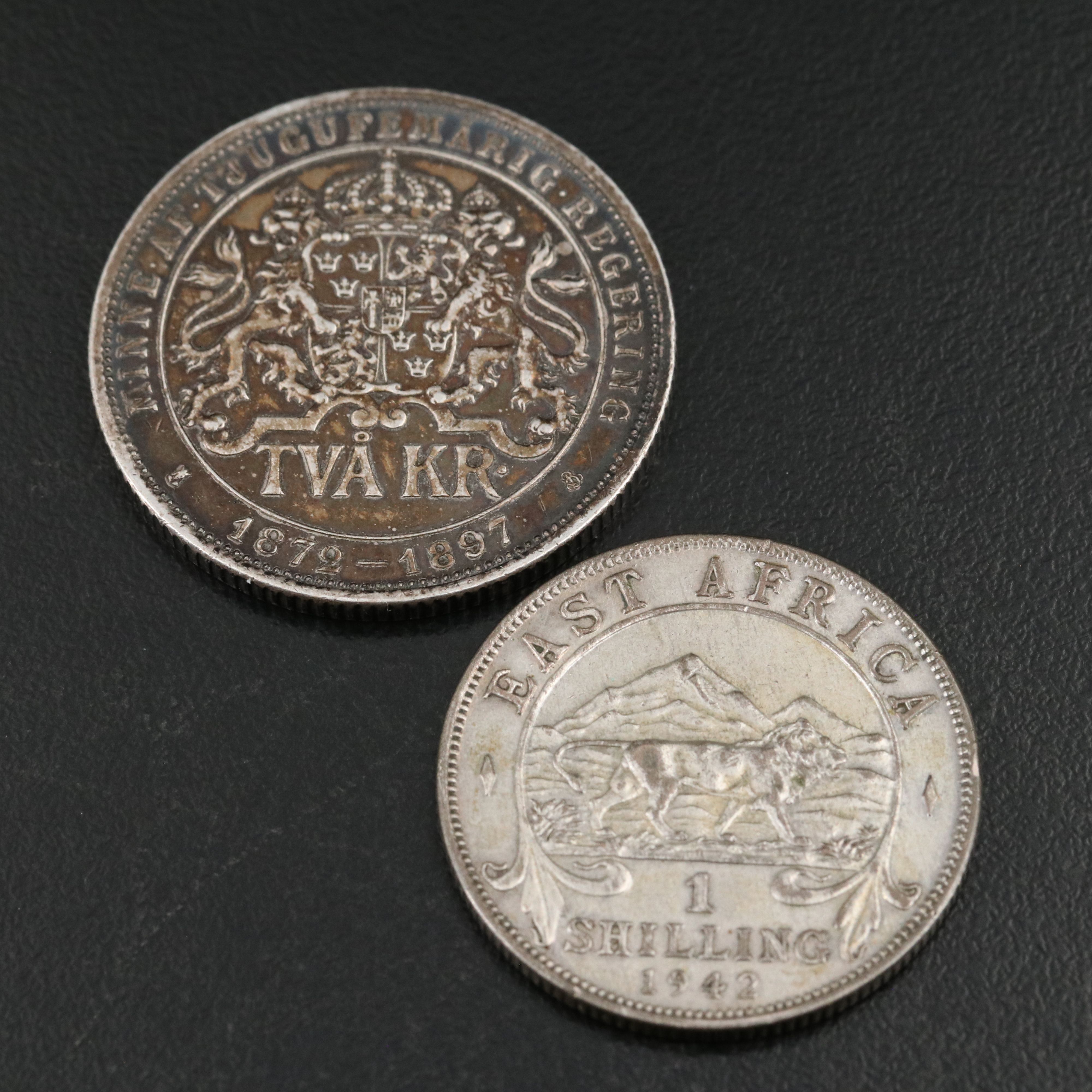 Seven Silver Foreign Coins Including an 1897 Sweden Silver 2 Kroner