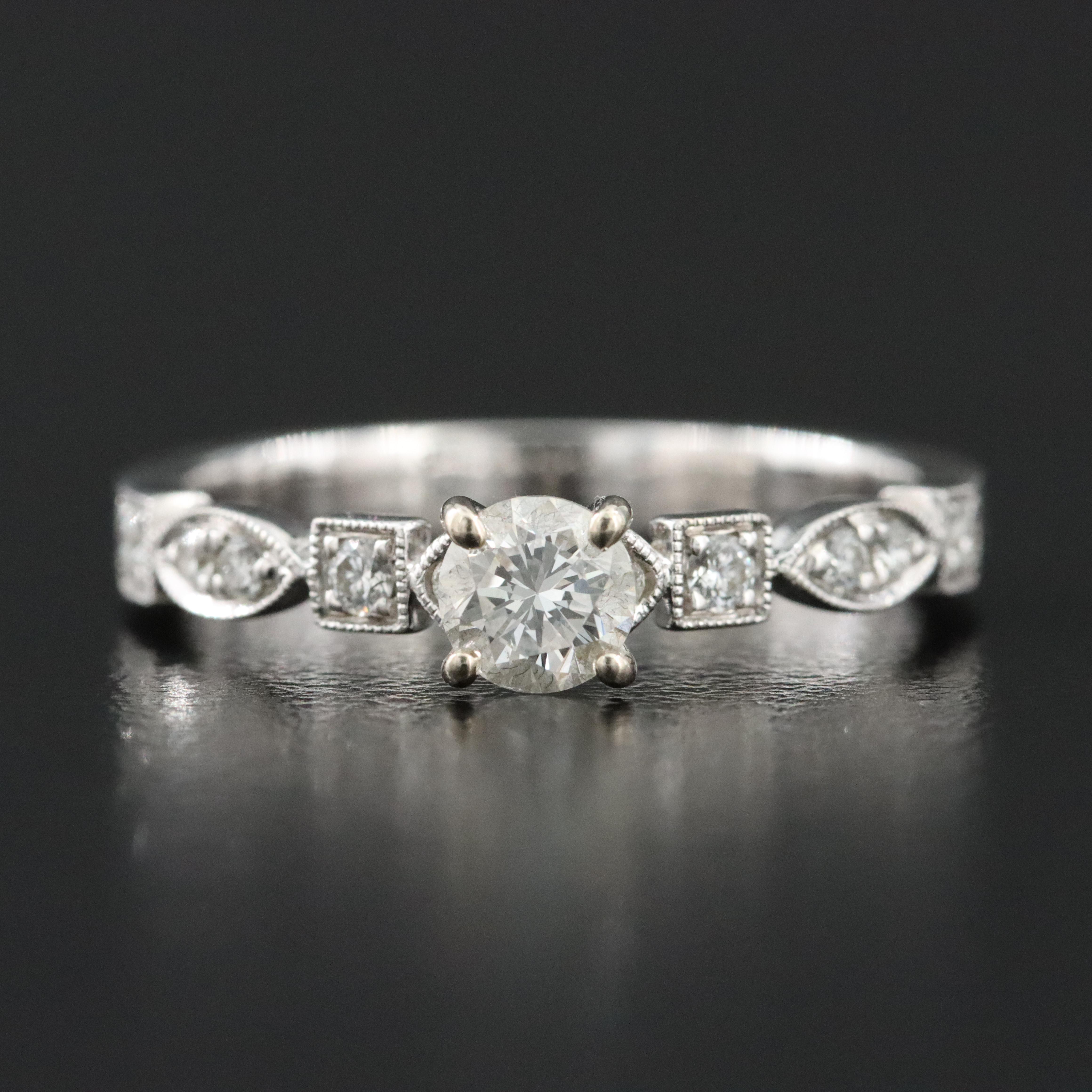 14K 0.58 CTW Diamond Ring