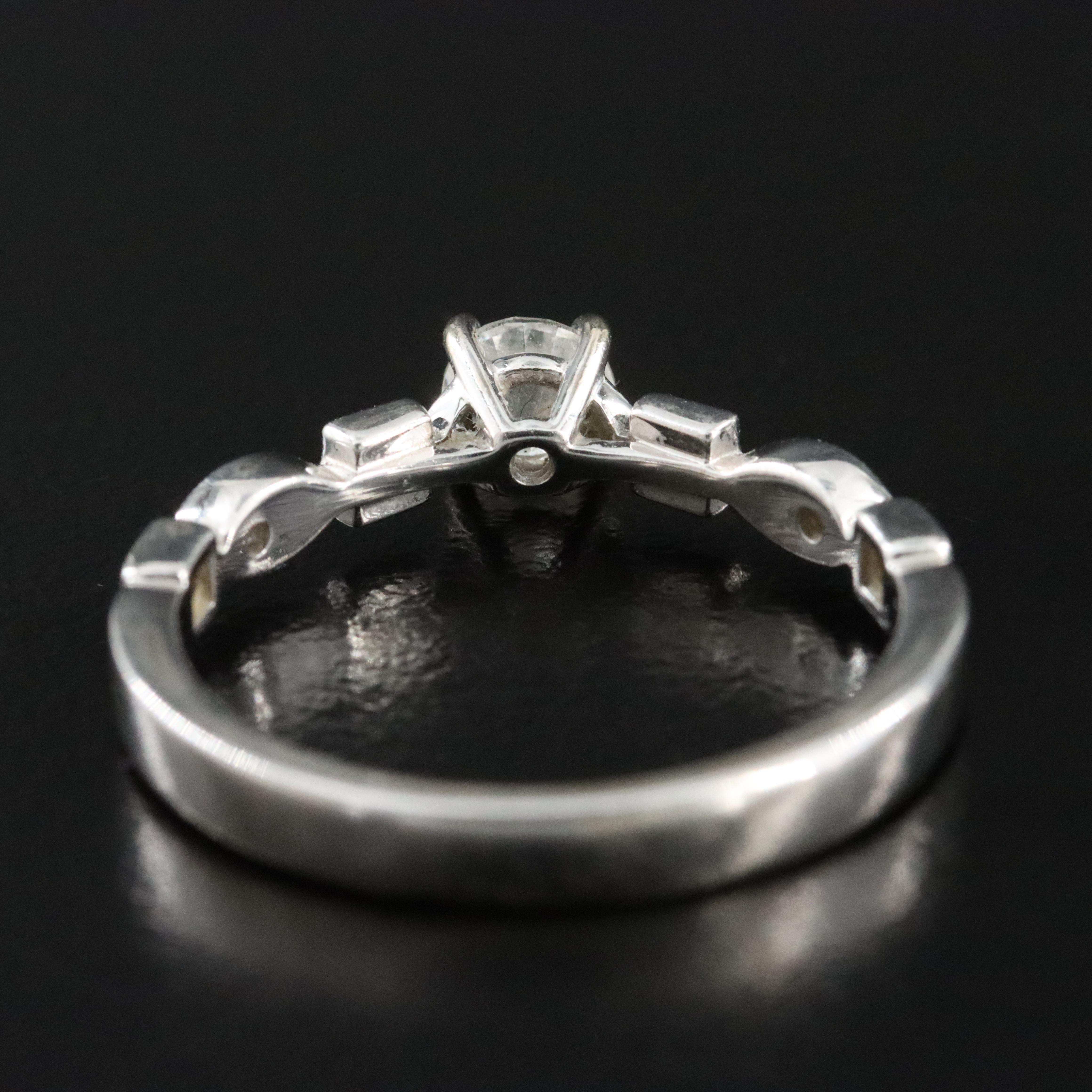 14K 0.58 CTW Diamond Ring