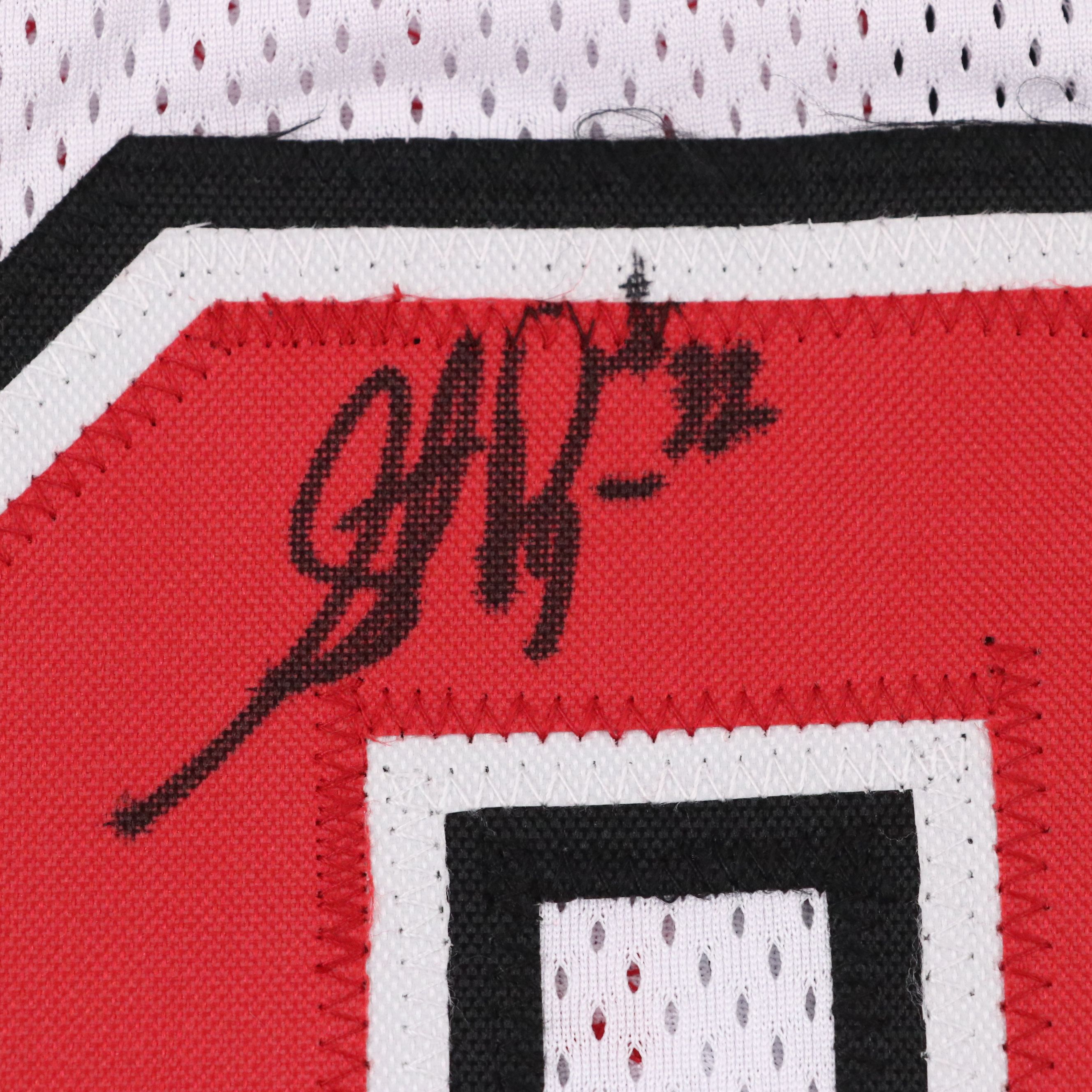 Larry Johnson, Stacy Augmon, Anderson Hunt, and Moses Scurry Signed UNLV Jersey