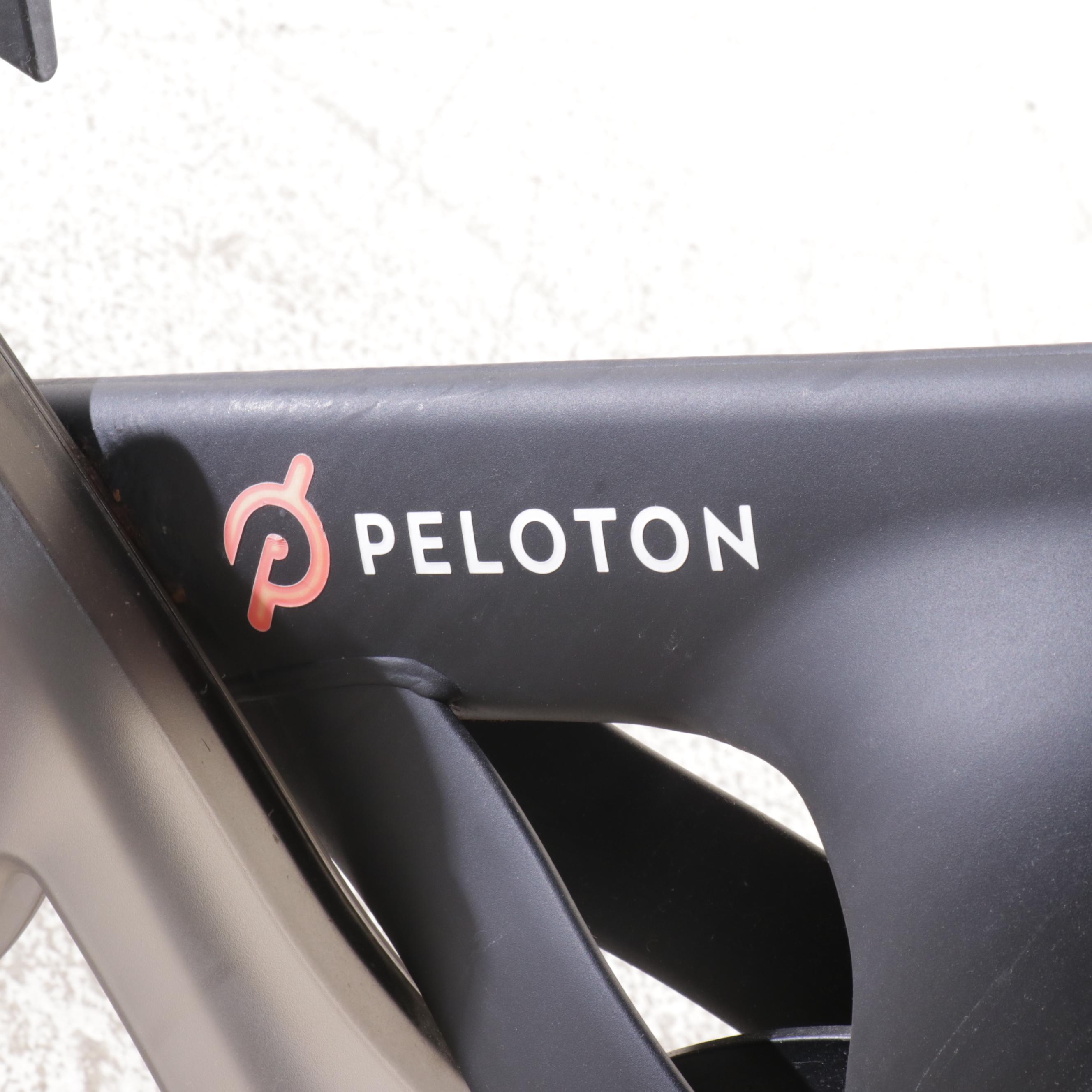 Peloton Stationary Bike with Accessories and Mat