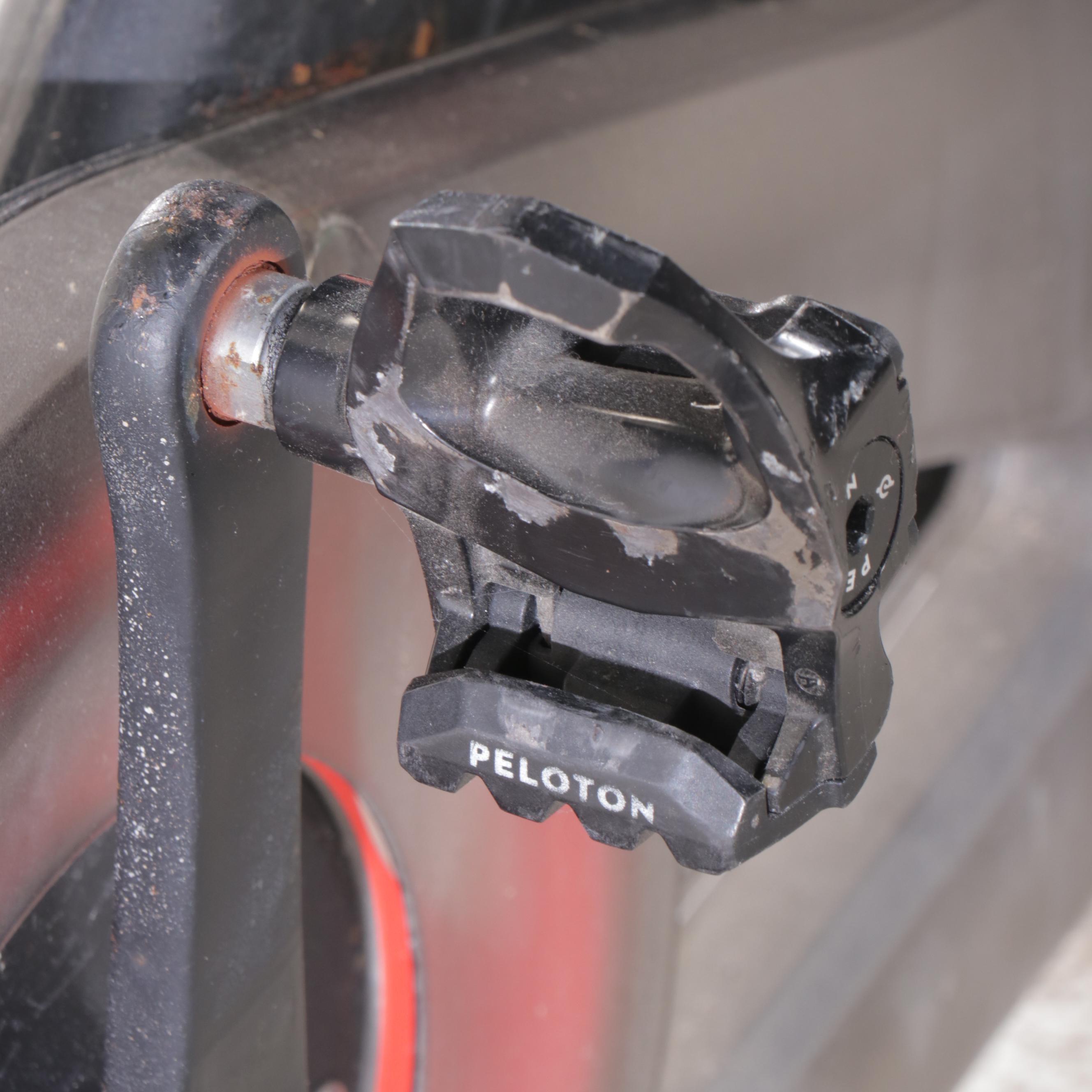 Peloton Stationary Bike with Accessories and Mat