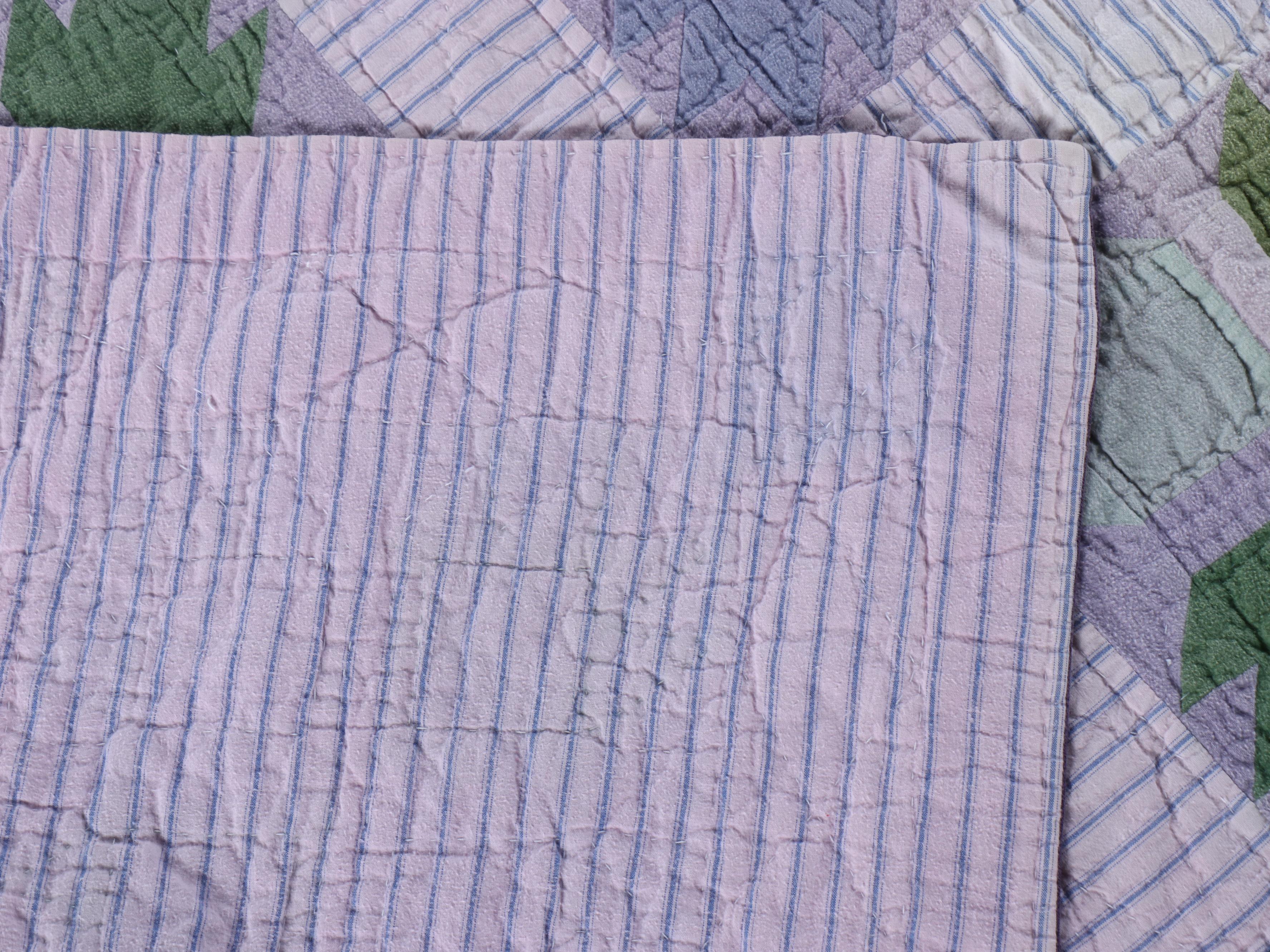 Handmade "Tulip" Pieced Flannel and Cotton Quilt, 20th Century