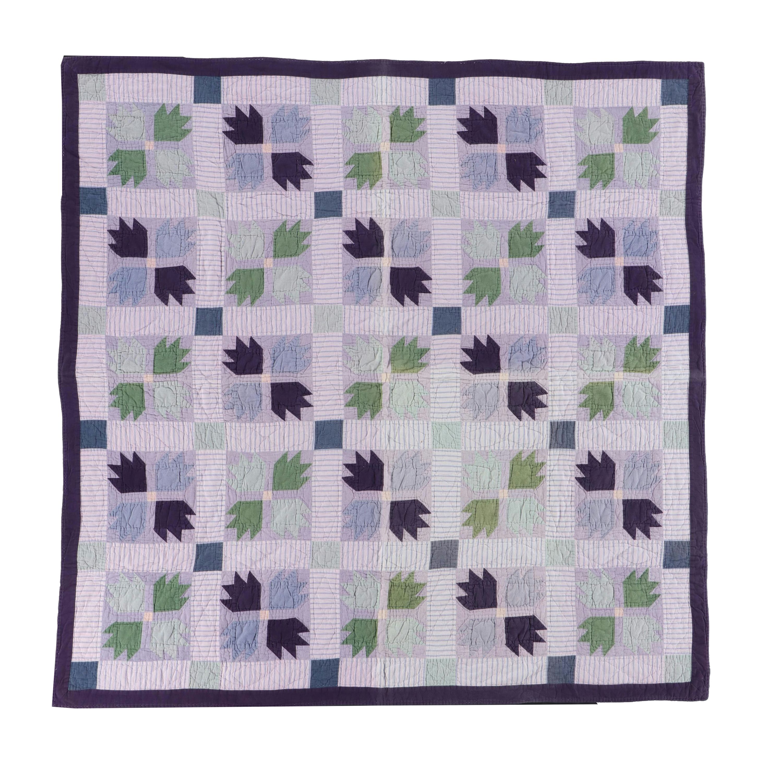 Handmade "Tulip" Pieced Flannel and Cotton Quilt, 20th Century