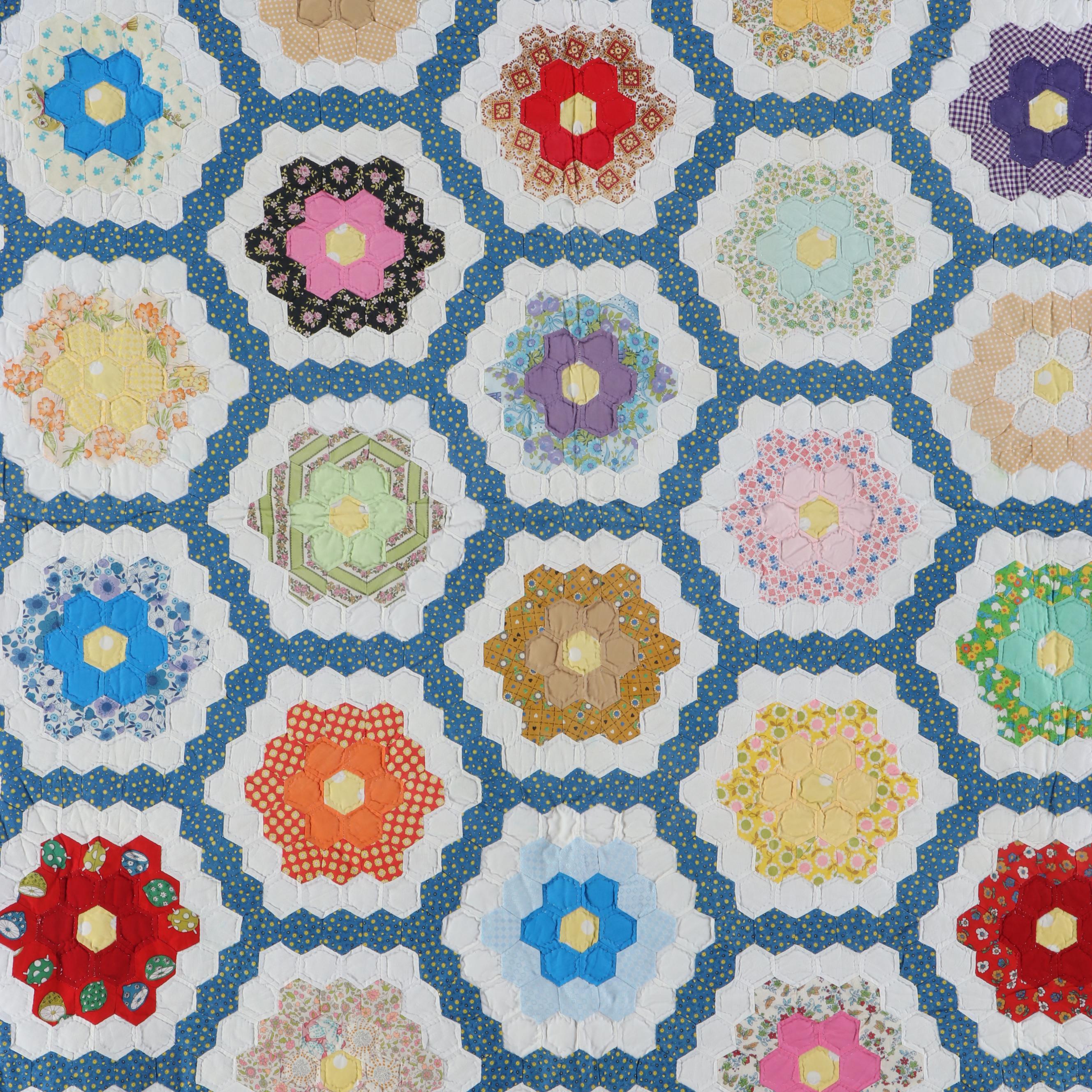 Handmade "Grandmother's Flower Garden" Pieced Quilt, 20th Century