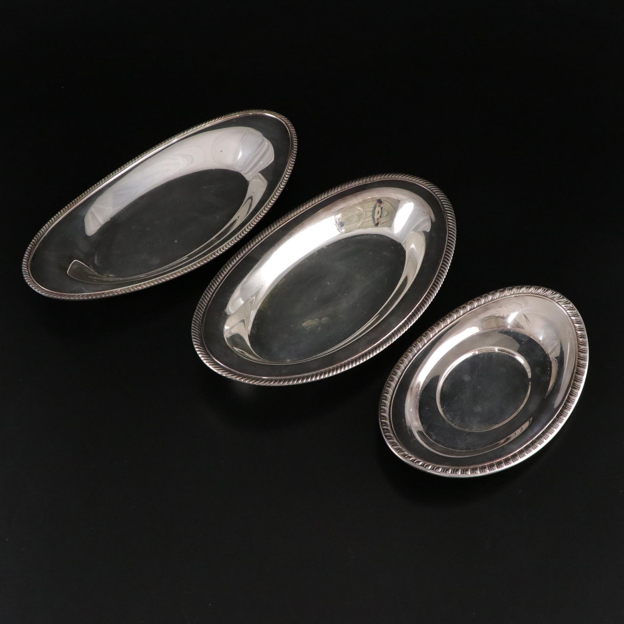 Pair of Westmoreland Weighted Sterling Candleholders with Other Tableware