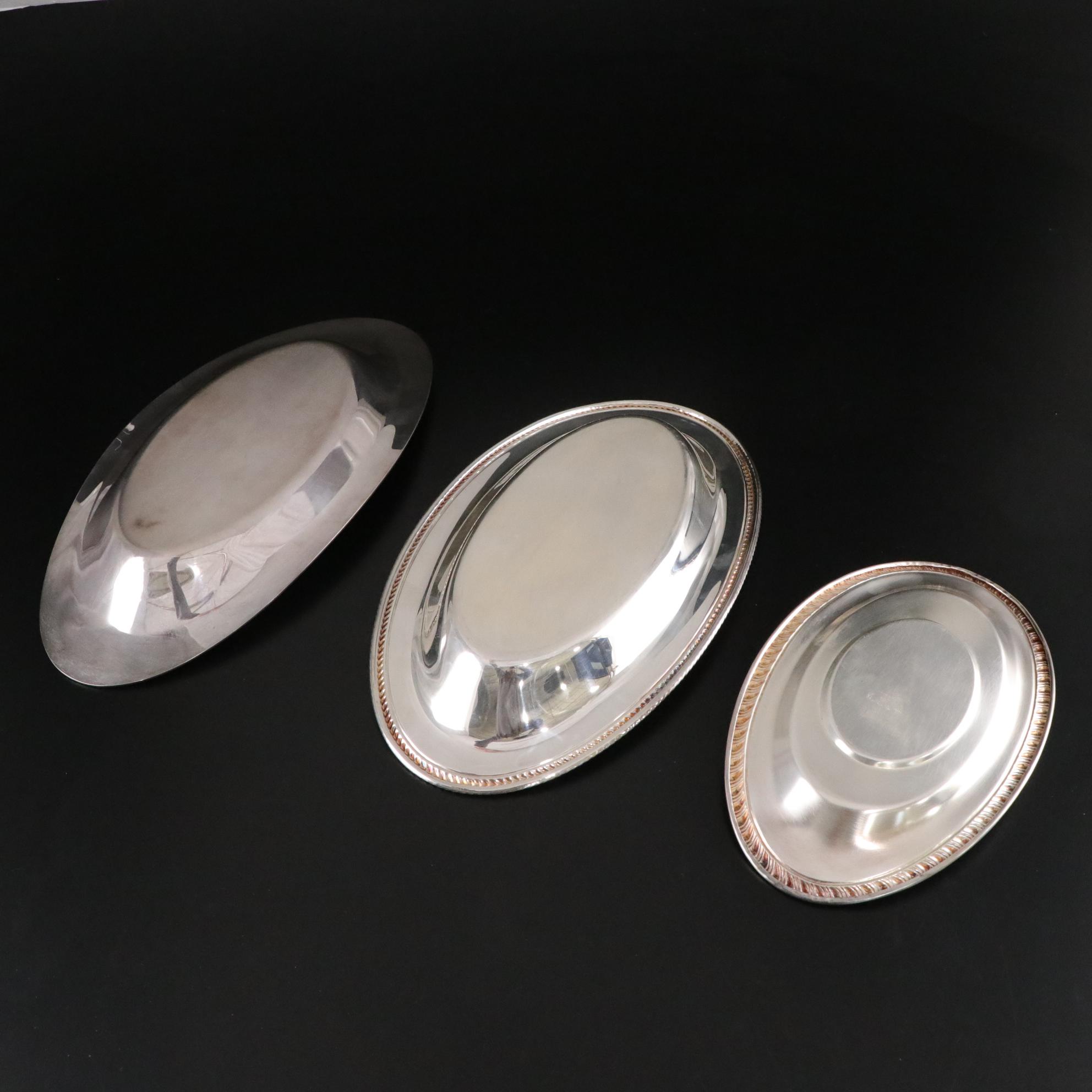 Pair of Westmoreland Weighted Sterling Candleholders with Other Tableware