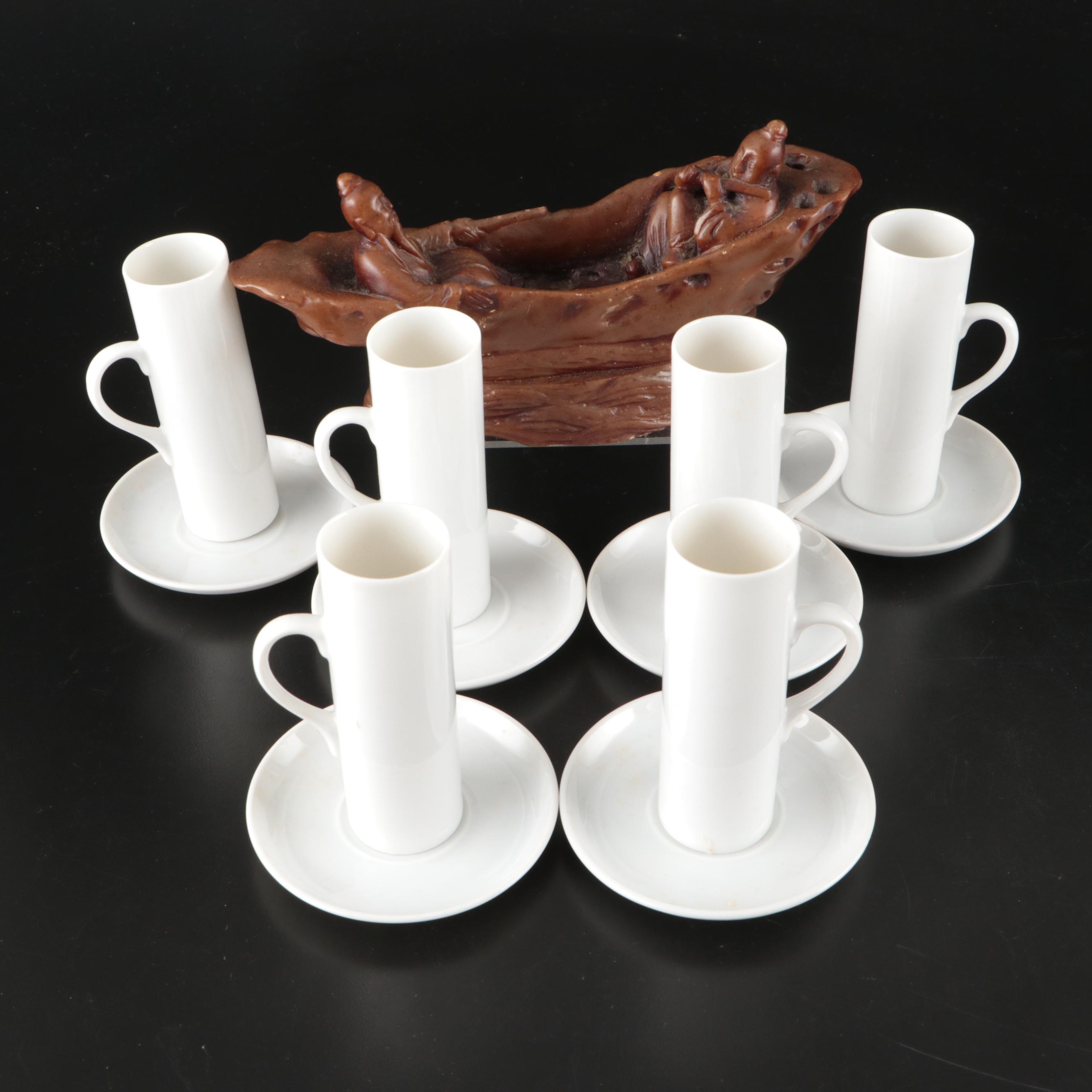 Schmid-60 Porcelain Demitasse Cups and Saucers with Carved Stone Figurine