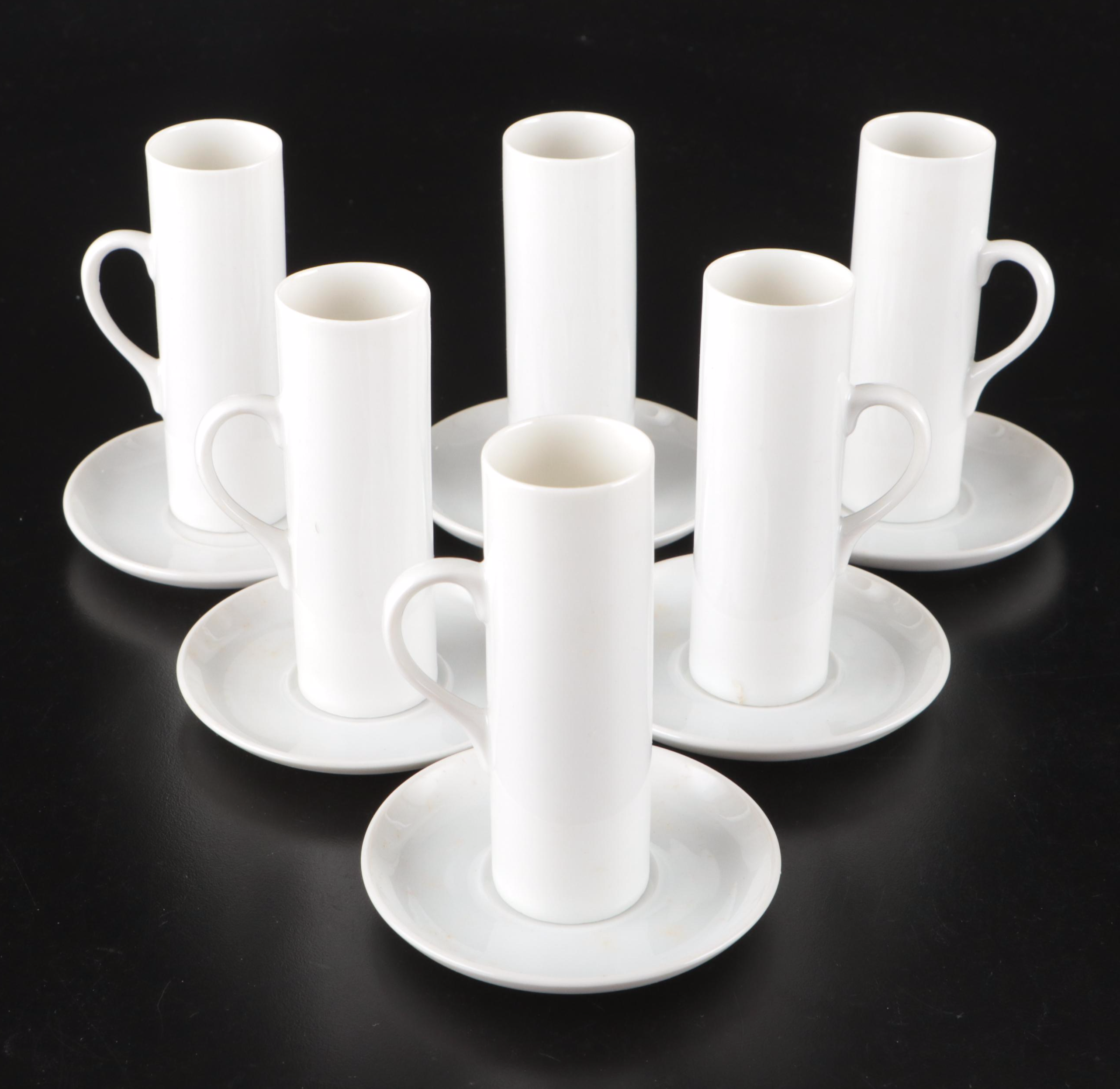 Schmid-60 Porcelain Demitasse Cups and Saucers with Carved Stone Figurine