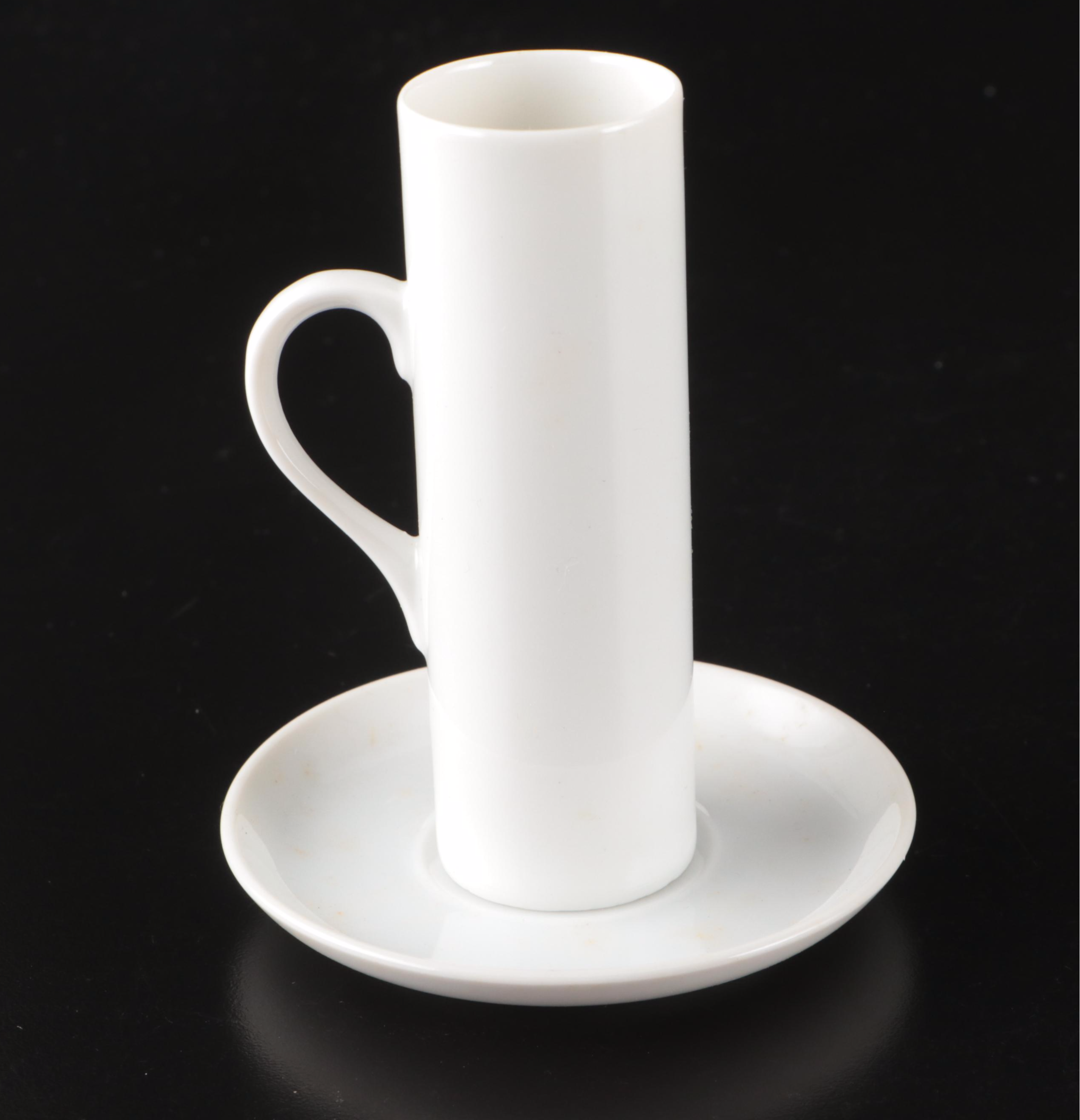 Schmid-60 Porcelain Demitasse Cups and Saucers with Carved Stone Figurine