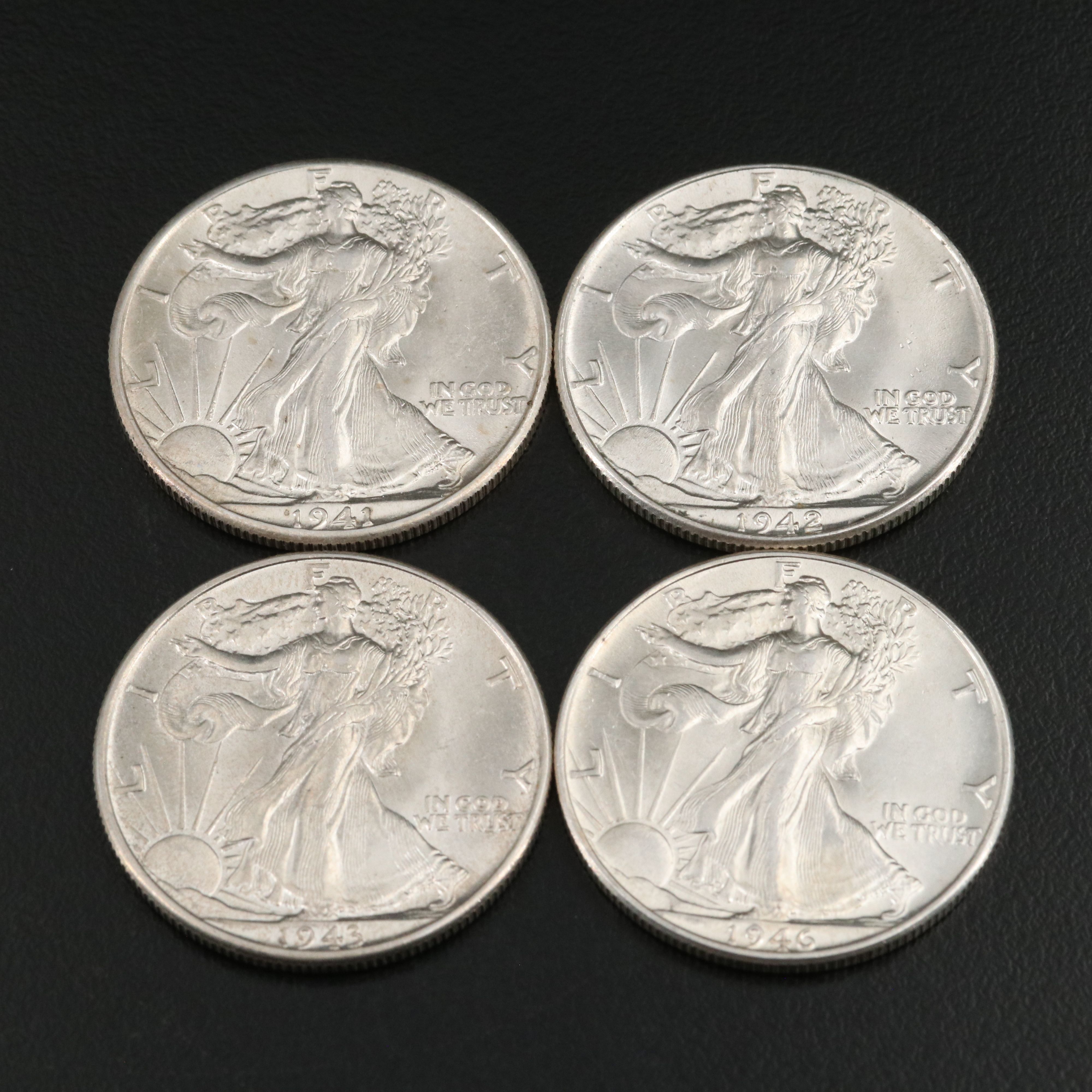 Four Walking Liberty Half Dollars, 1941, 1942, 1943, and 1946
