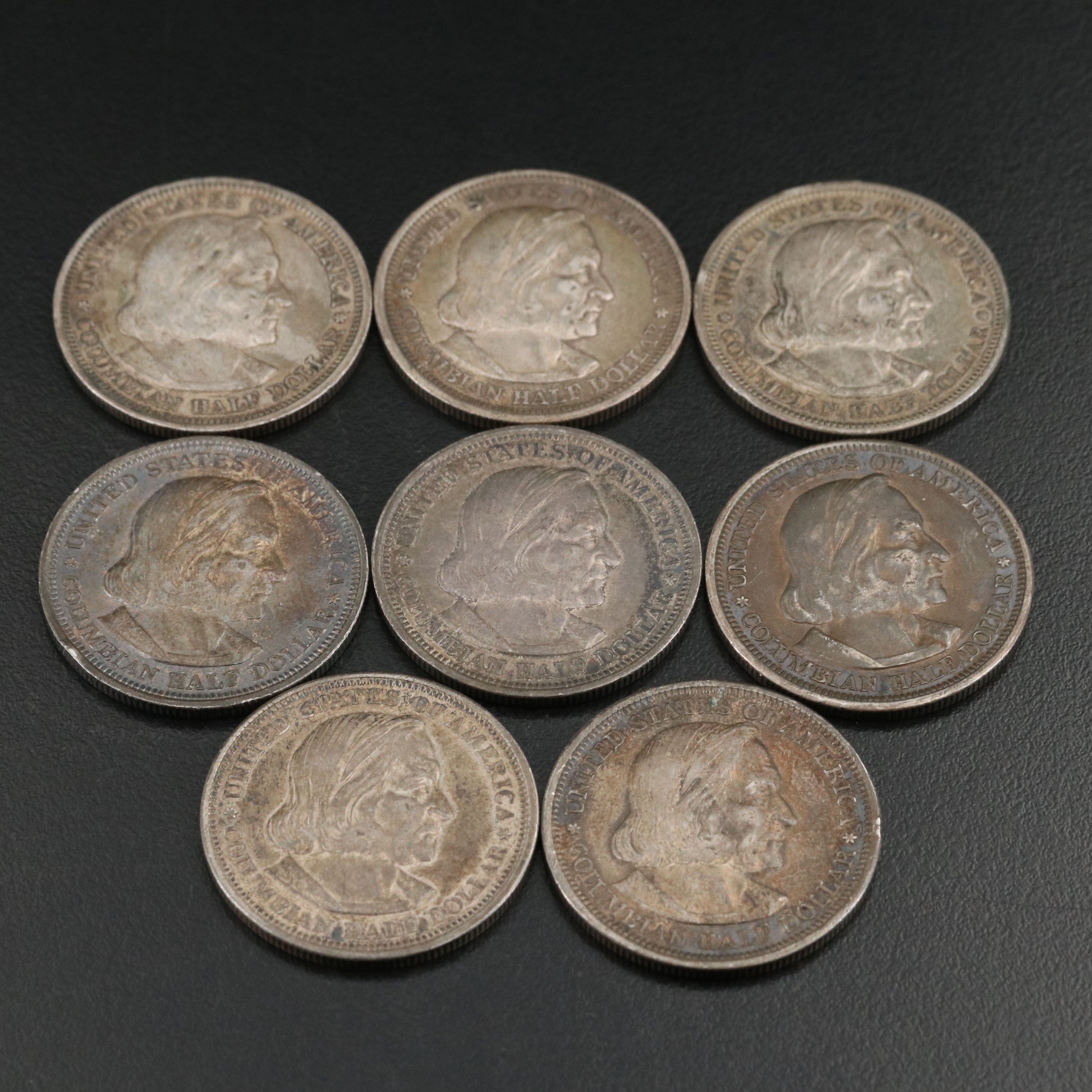 Eight 1893  Colombian Commemorative Silver Half Dollars