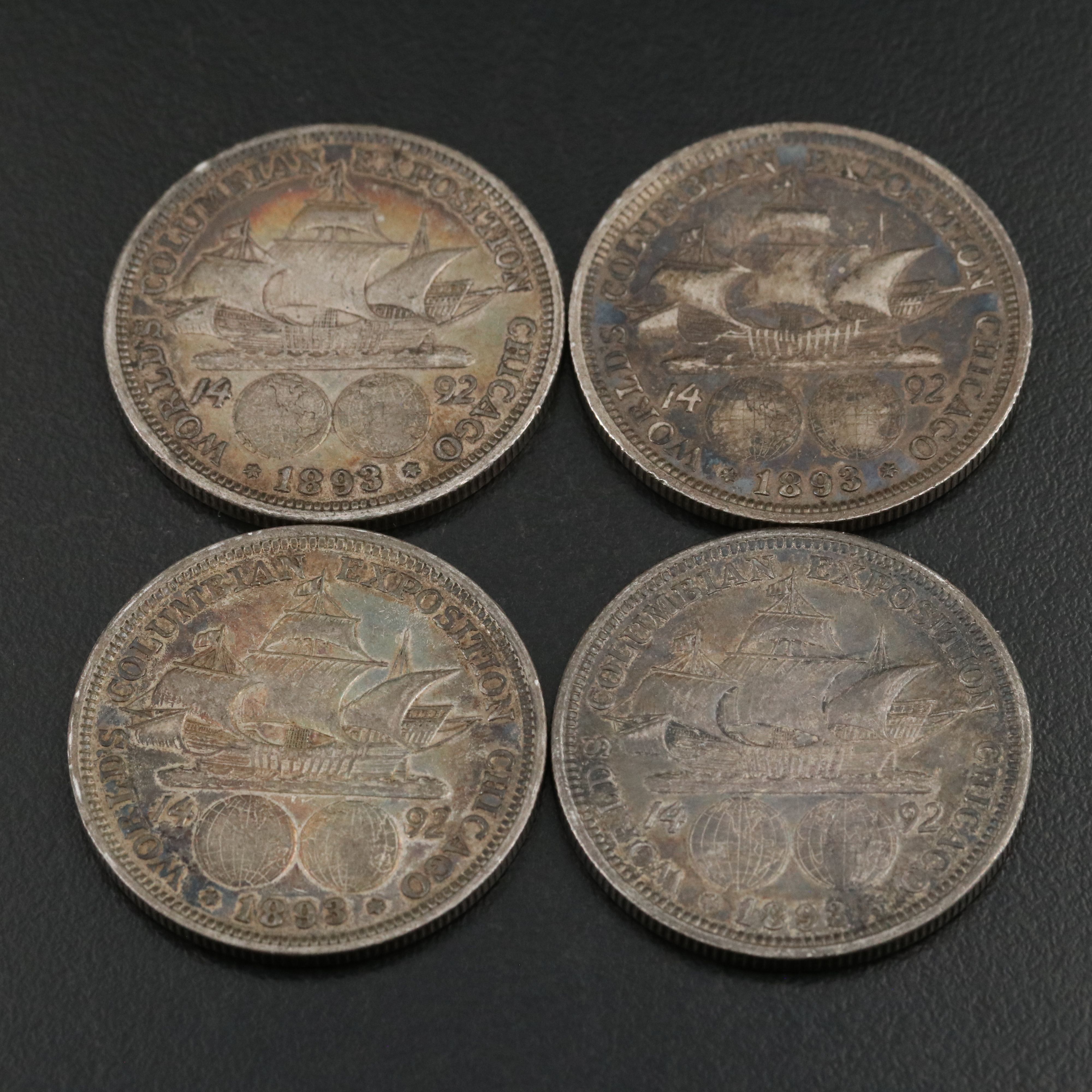 Eight 1893  Colombian Commemorative Silver Half Dollars