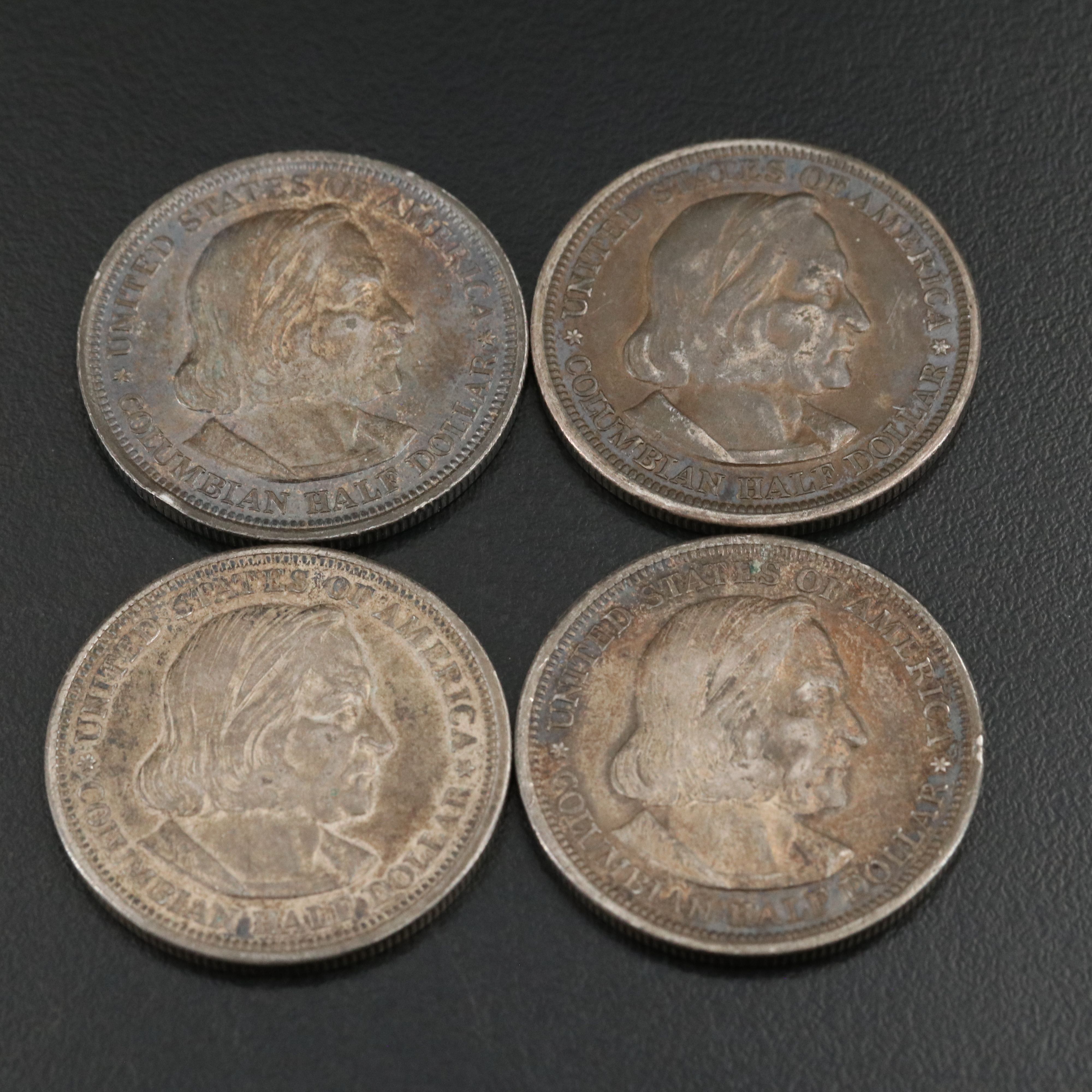 Eight 1893  Colombian Commemorative Silver Half Dollars
