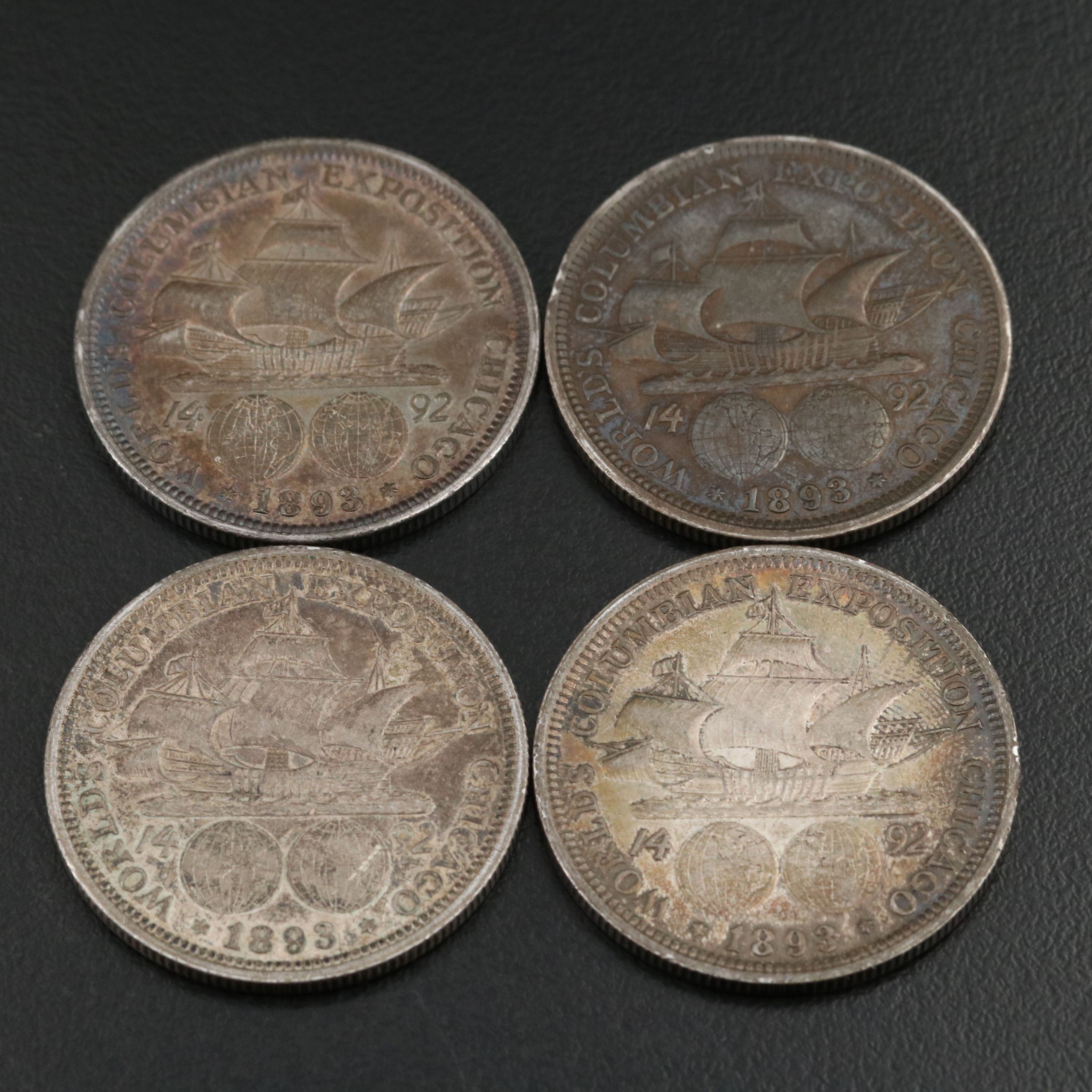 Eight 1893  Colombian Commemorative Silver Half Dollars