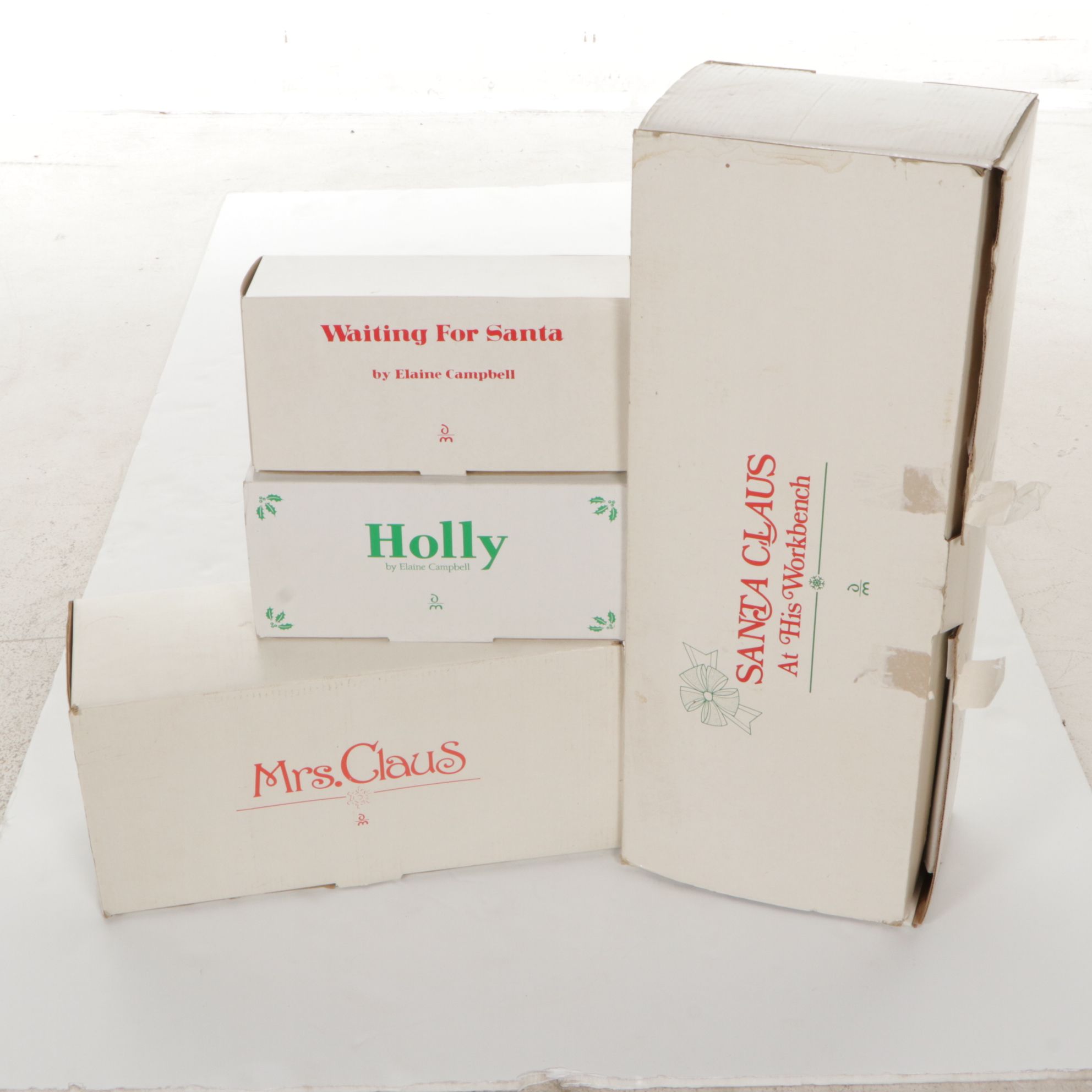 Santa Claus and His Workbench with Mrs. Claus and Holiday Dolls by Danbury Mint