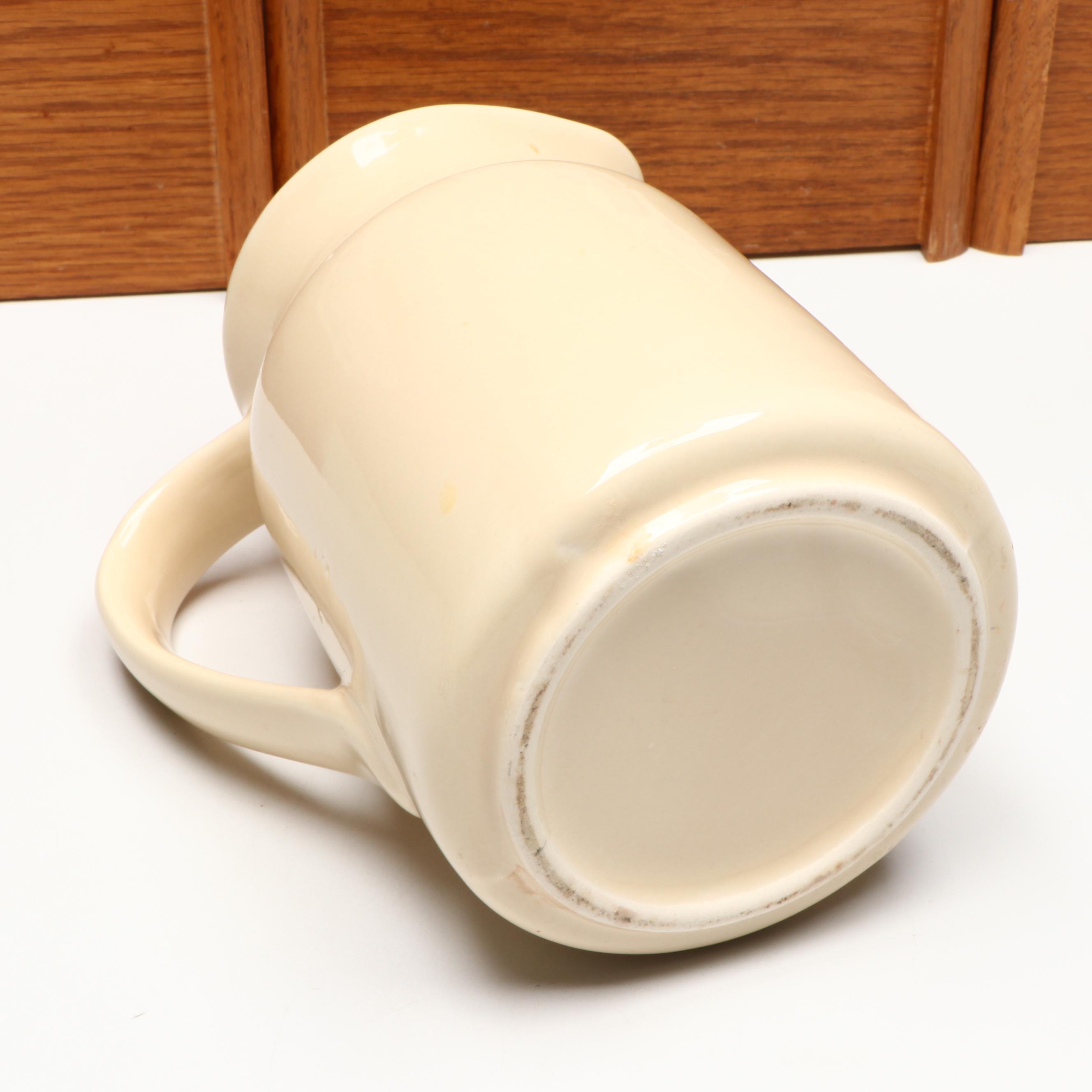 Wooden Kitchen Canisters, Ceramic Pitcher, and Glass Tumblers