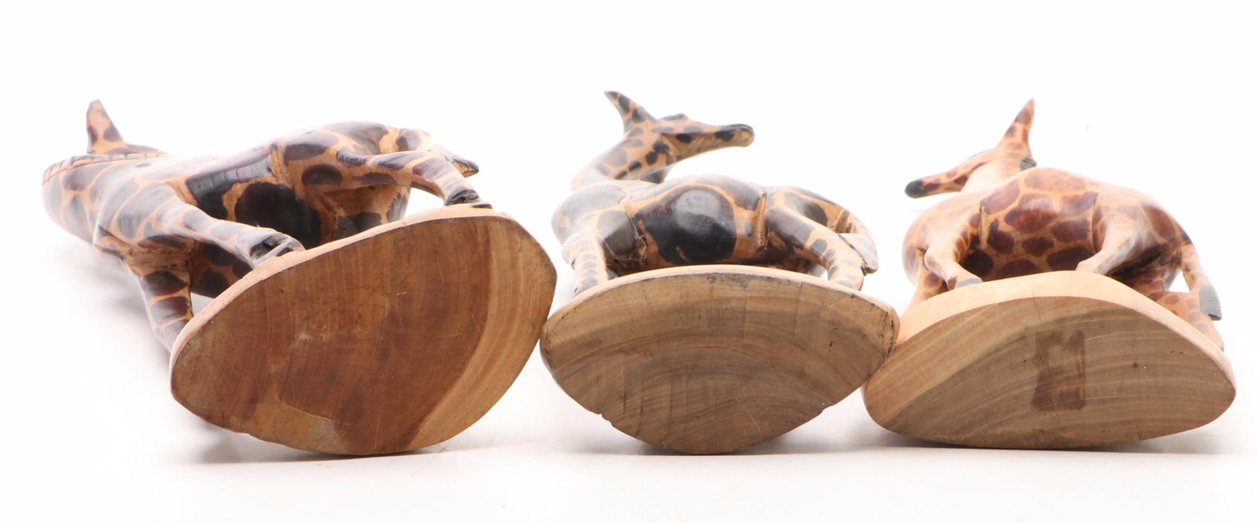 Carved Wood and Wrapped Leather Giraffes with Zebra