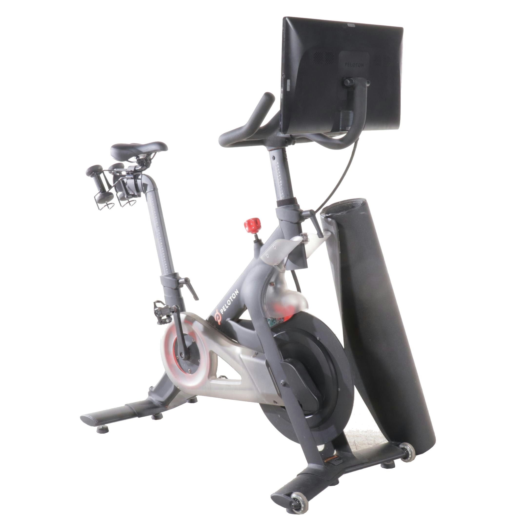 Peloton Stationary Bike with Accessories and Mat