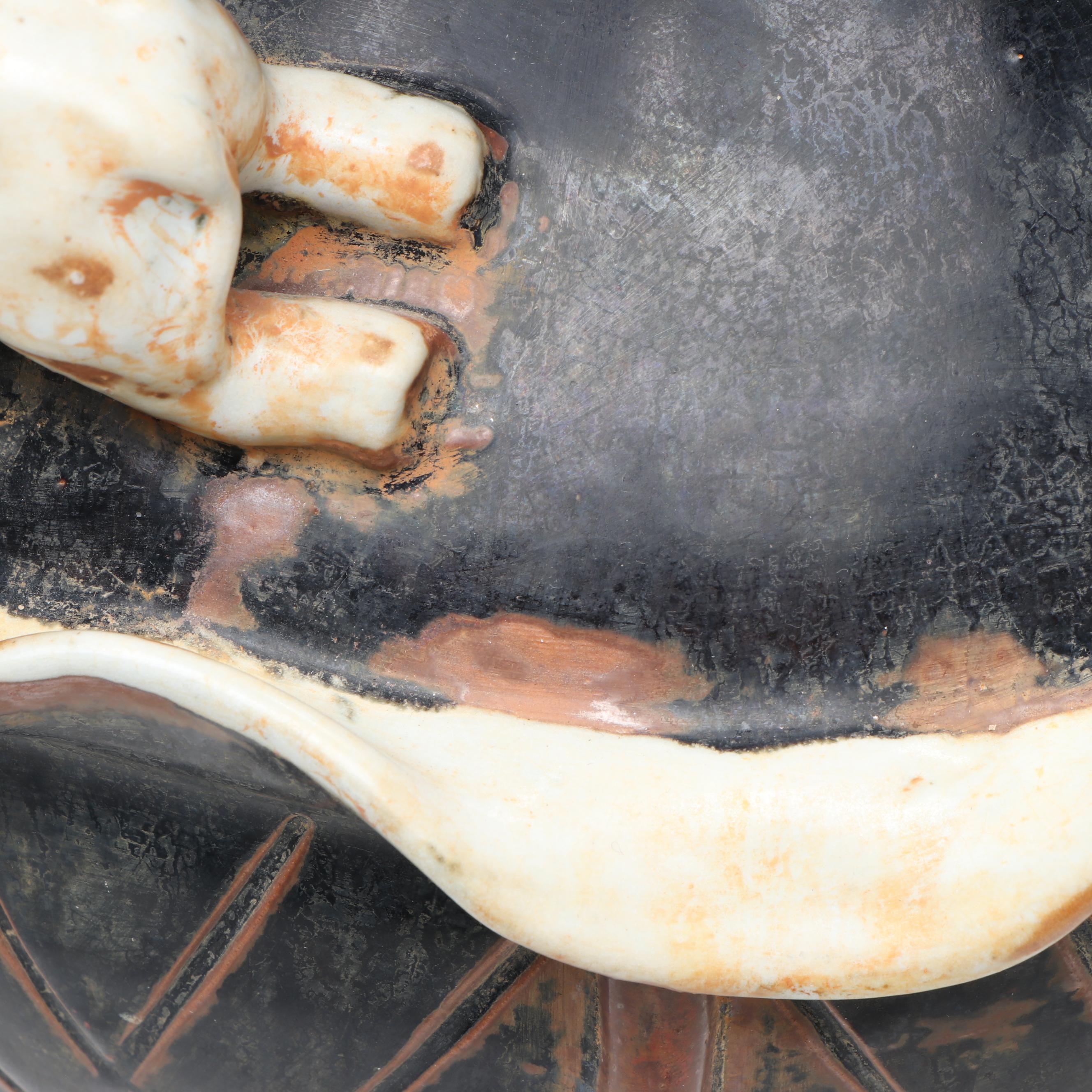Ceramic Vase with Elephant Ornamentation and Carved Wood Seed Pod Décor