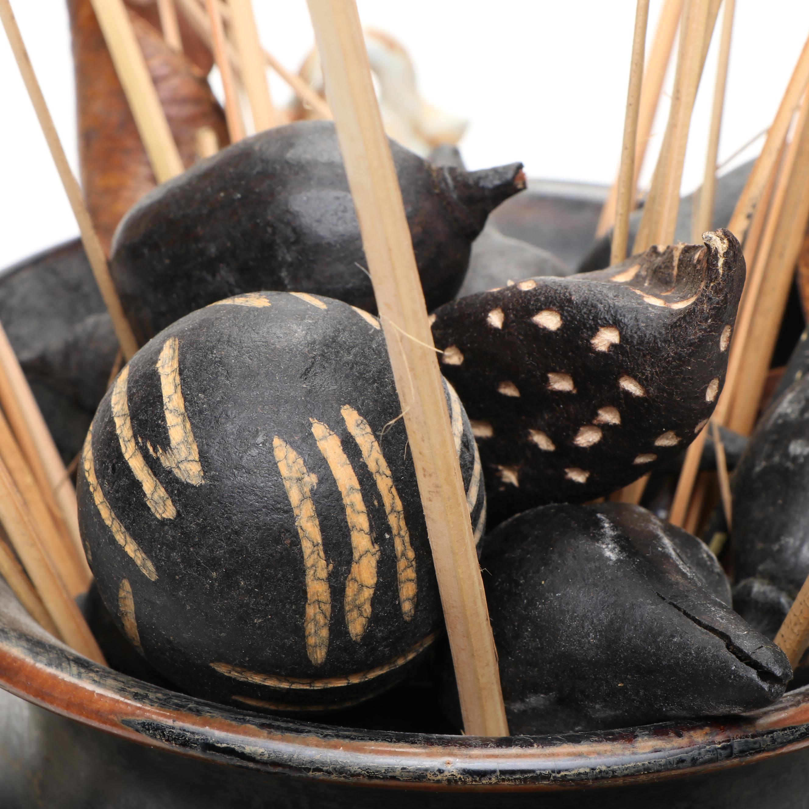 Ceramic Vase with Elephant Ornamentation and Carved Wood Seed Pod Décor
