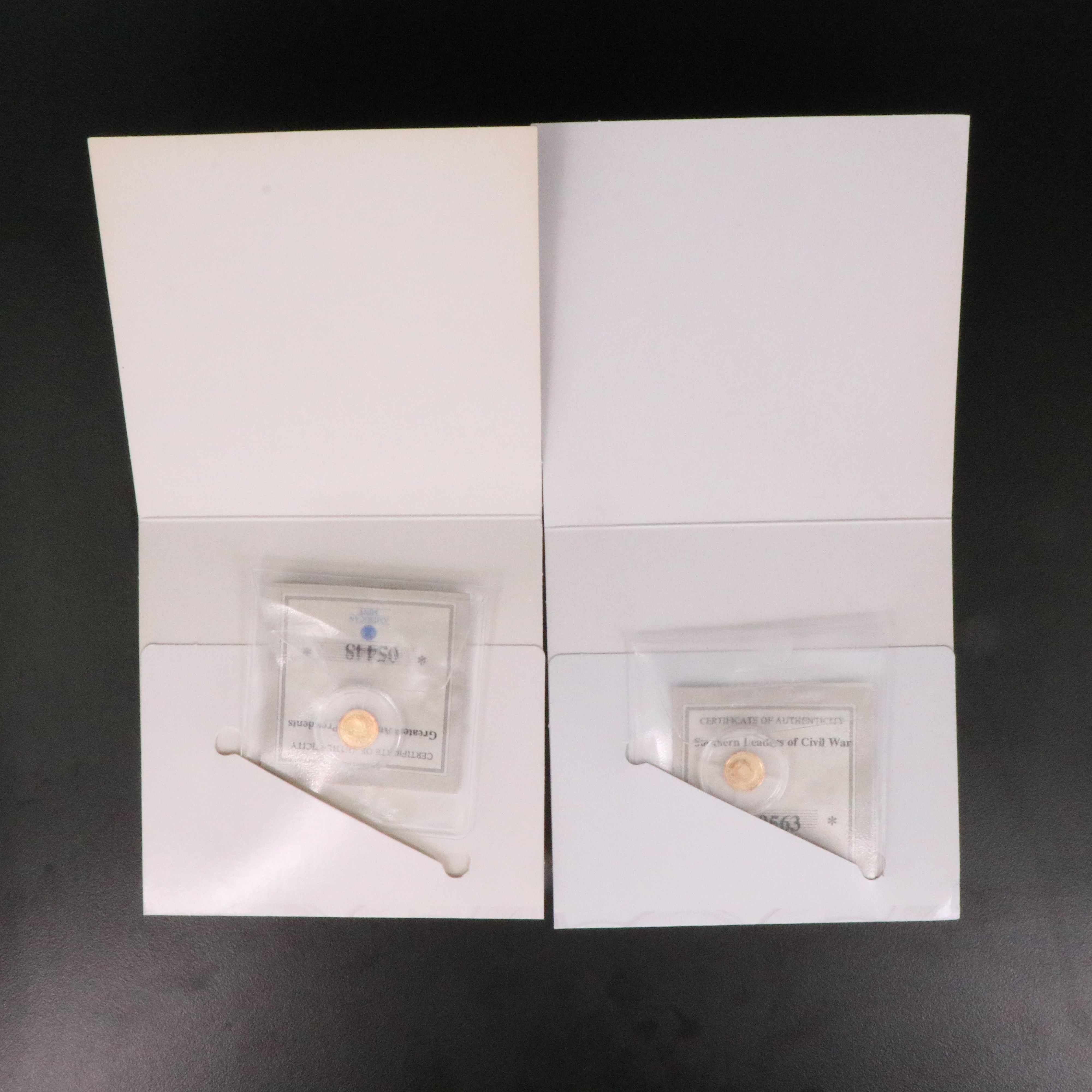 Two, One Half Gram .585 Gold Miniature Coins