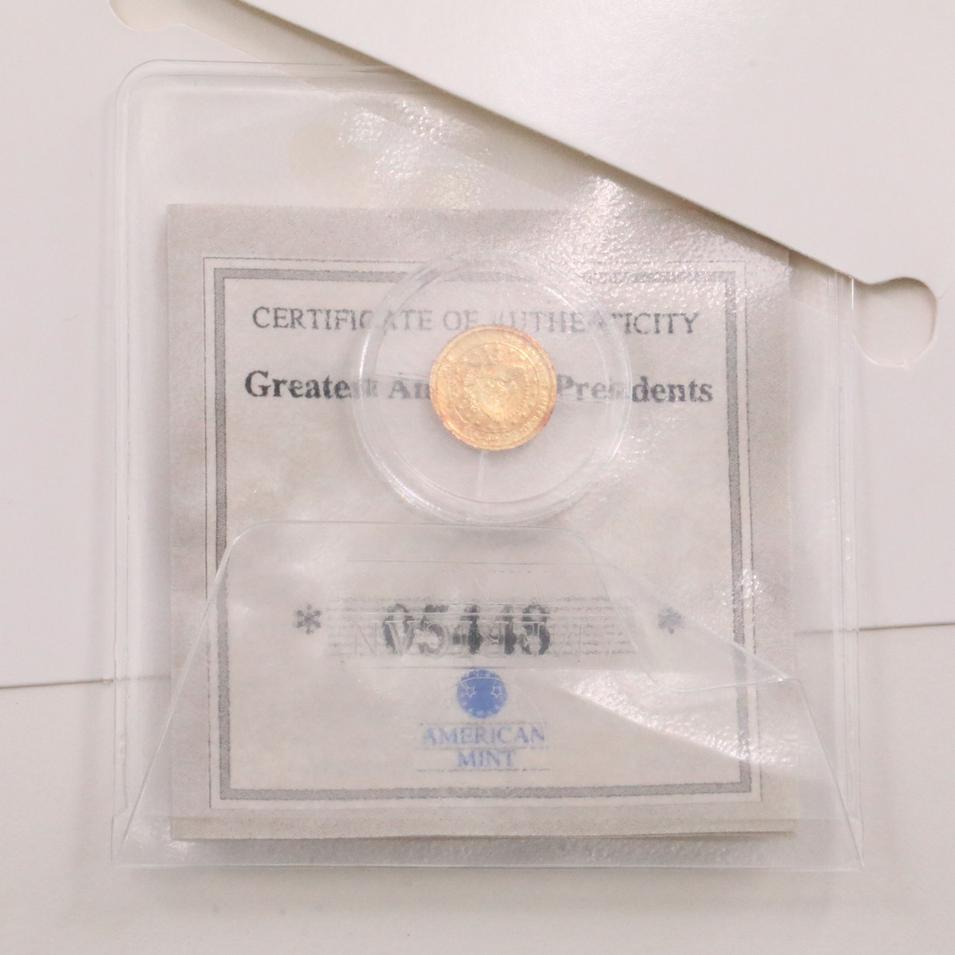 Two, One Half Gram .585 Gold Miniature Coins