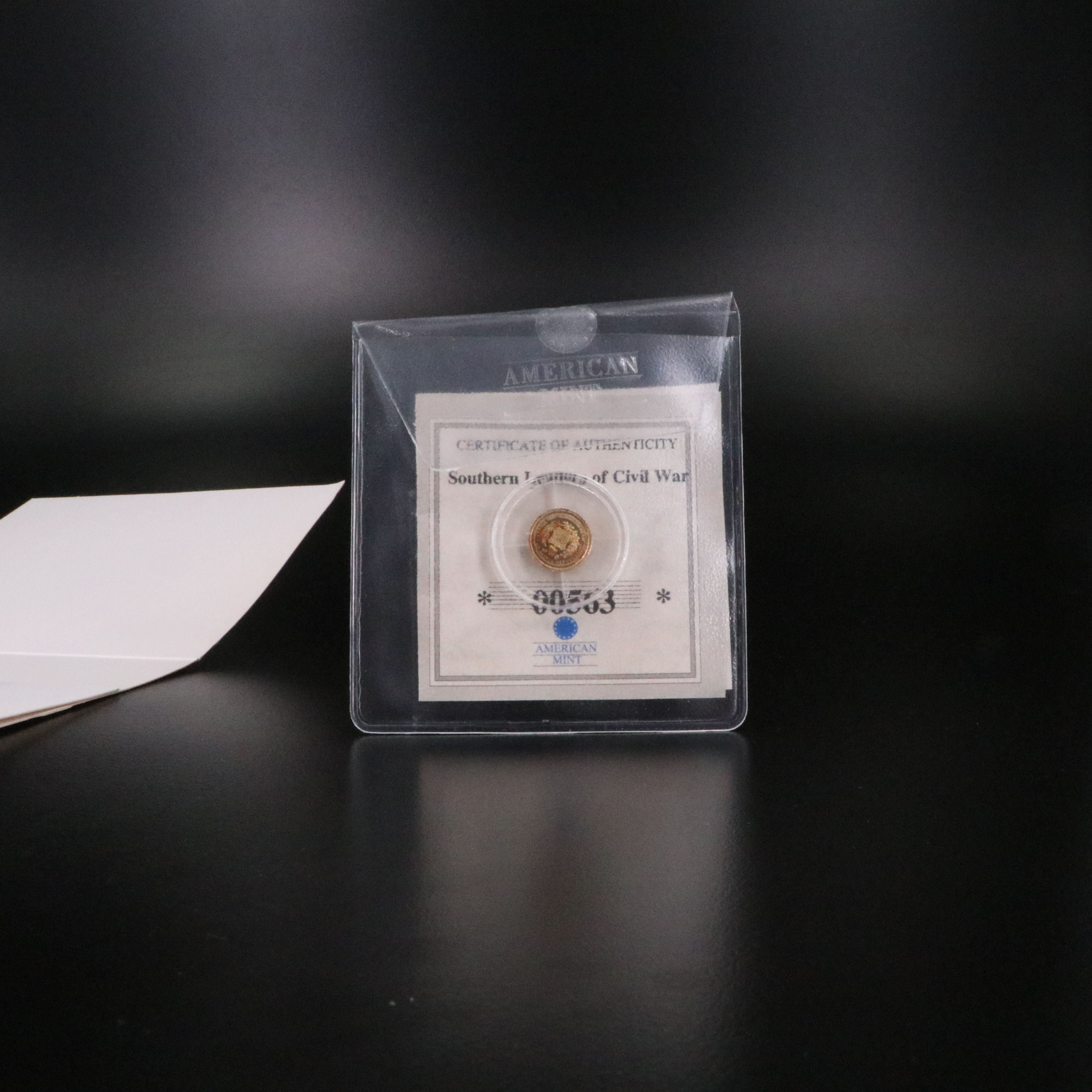 Two, One Half Gram .585 Gold Miniature Coins