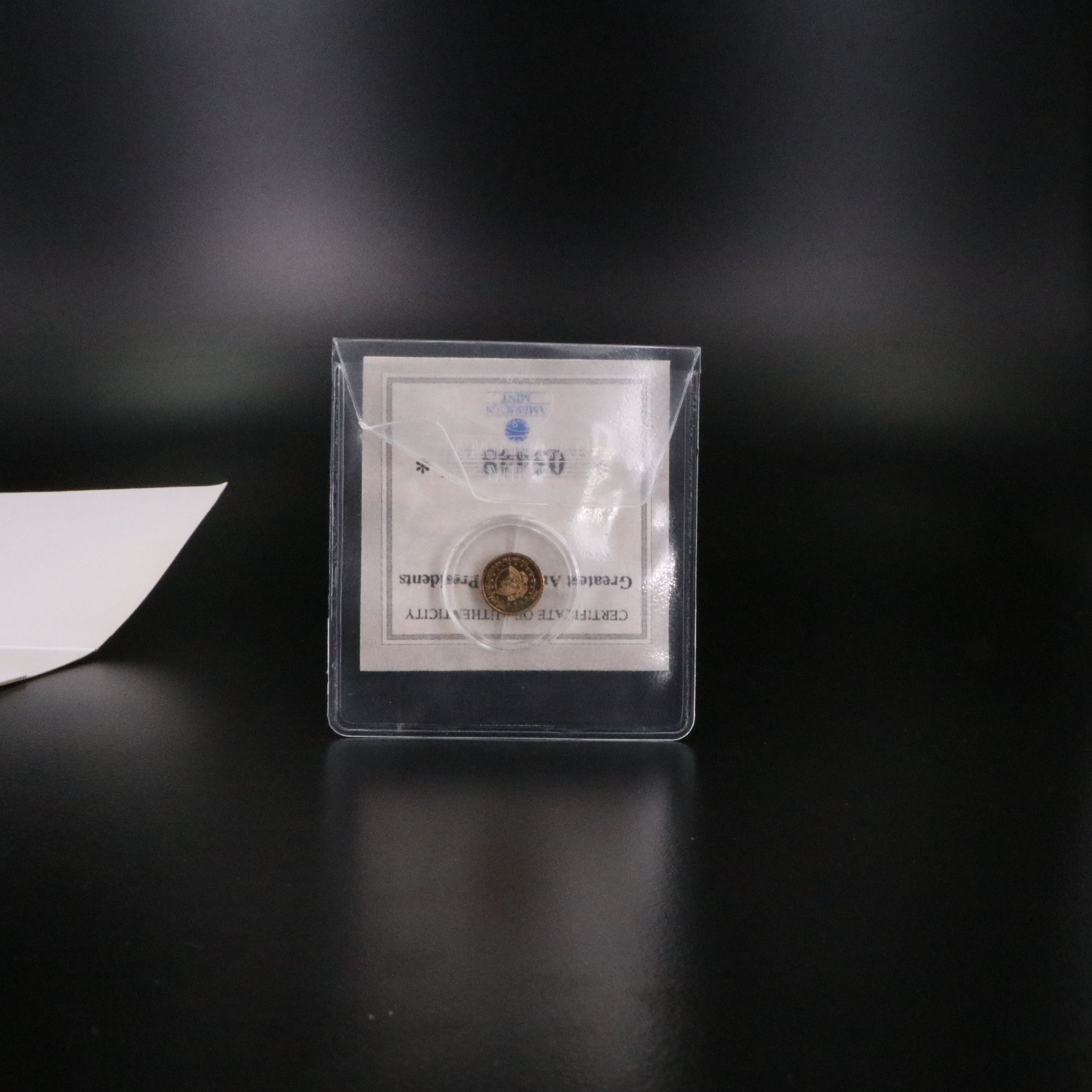 Two, One Half Gram .585 Gold Miniature Coins