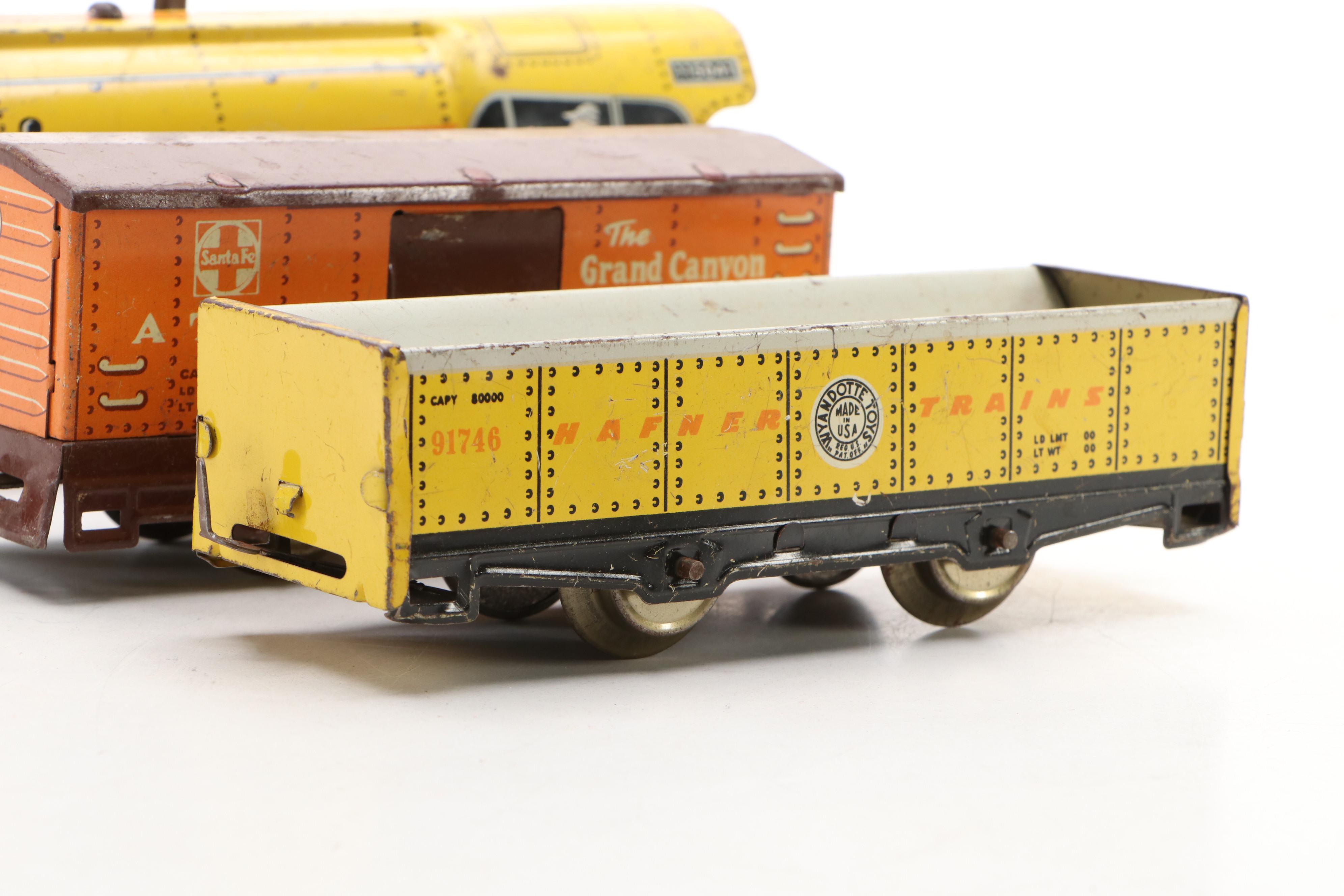 Vintage Hafner Locomotive with Santa Fe Boxcar and Other Tin Litho Train Cars