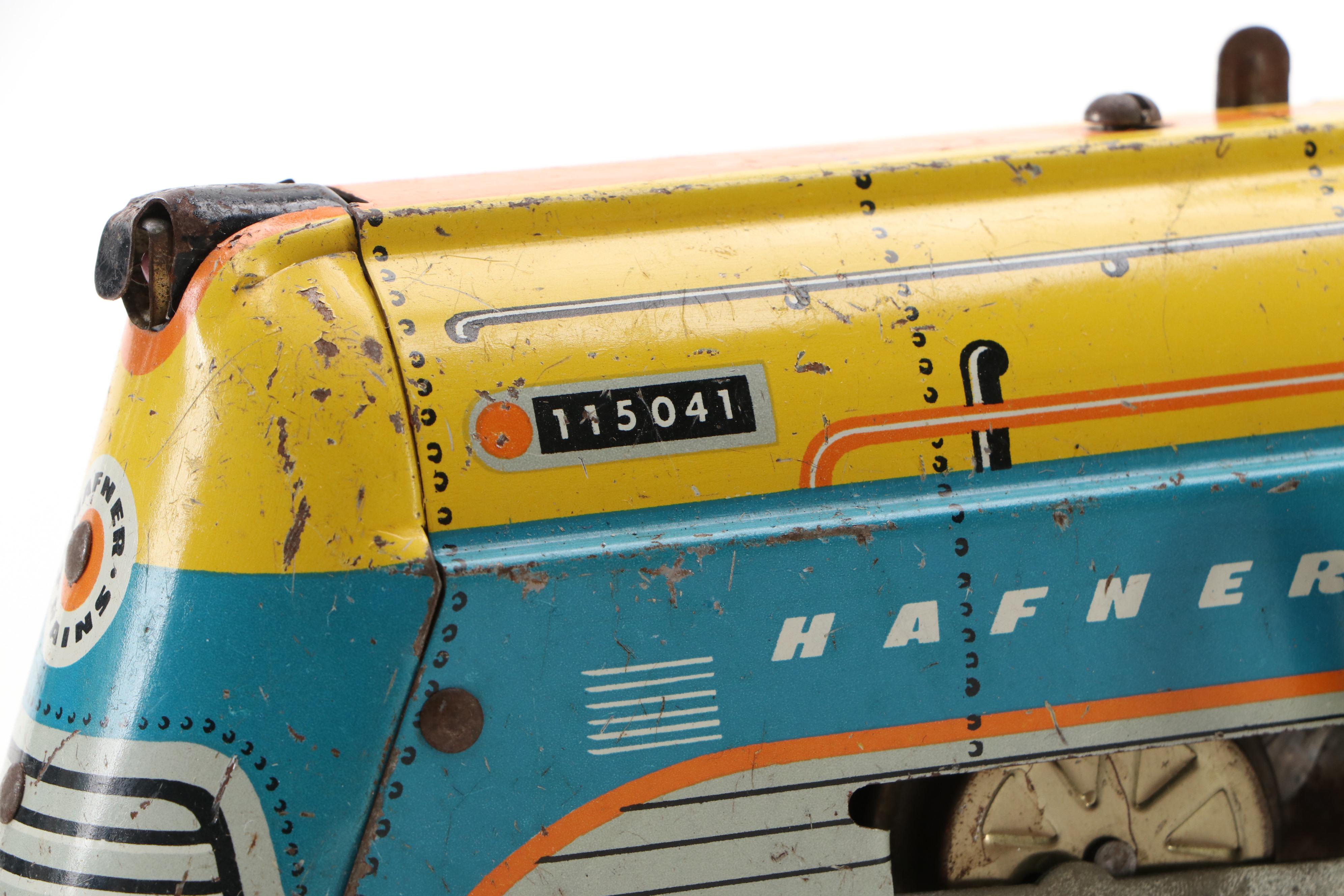 Vintage Hafner Locomotive with Santa Fe Boxcar and Other Tin Litho Train Cars