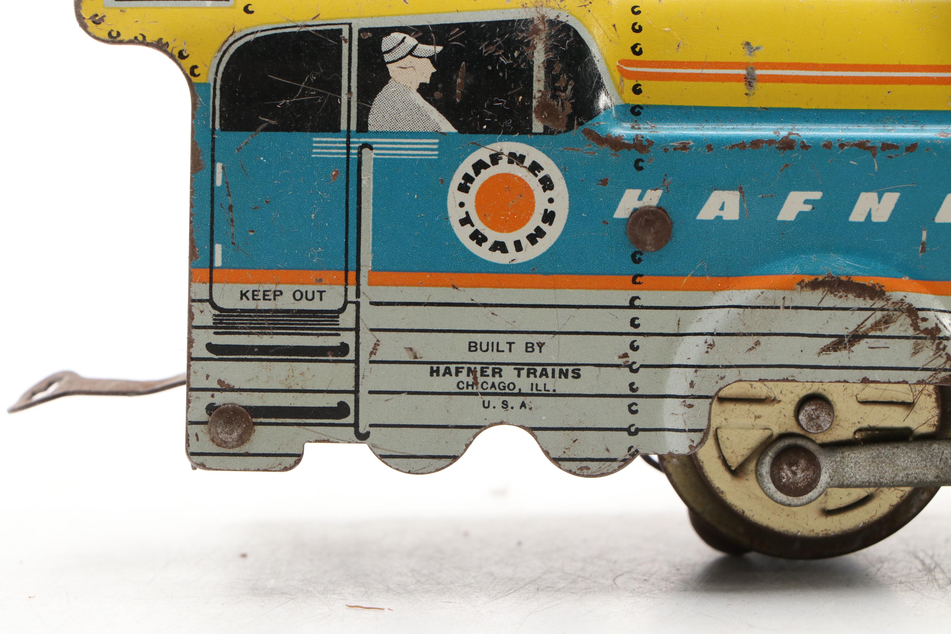 Vintage Hafner Locomotive with Santa Fe Boxcar and Other Tin Litho Train Cars