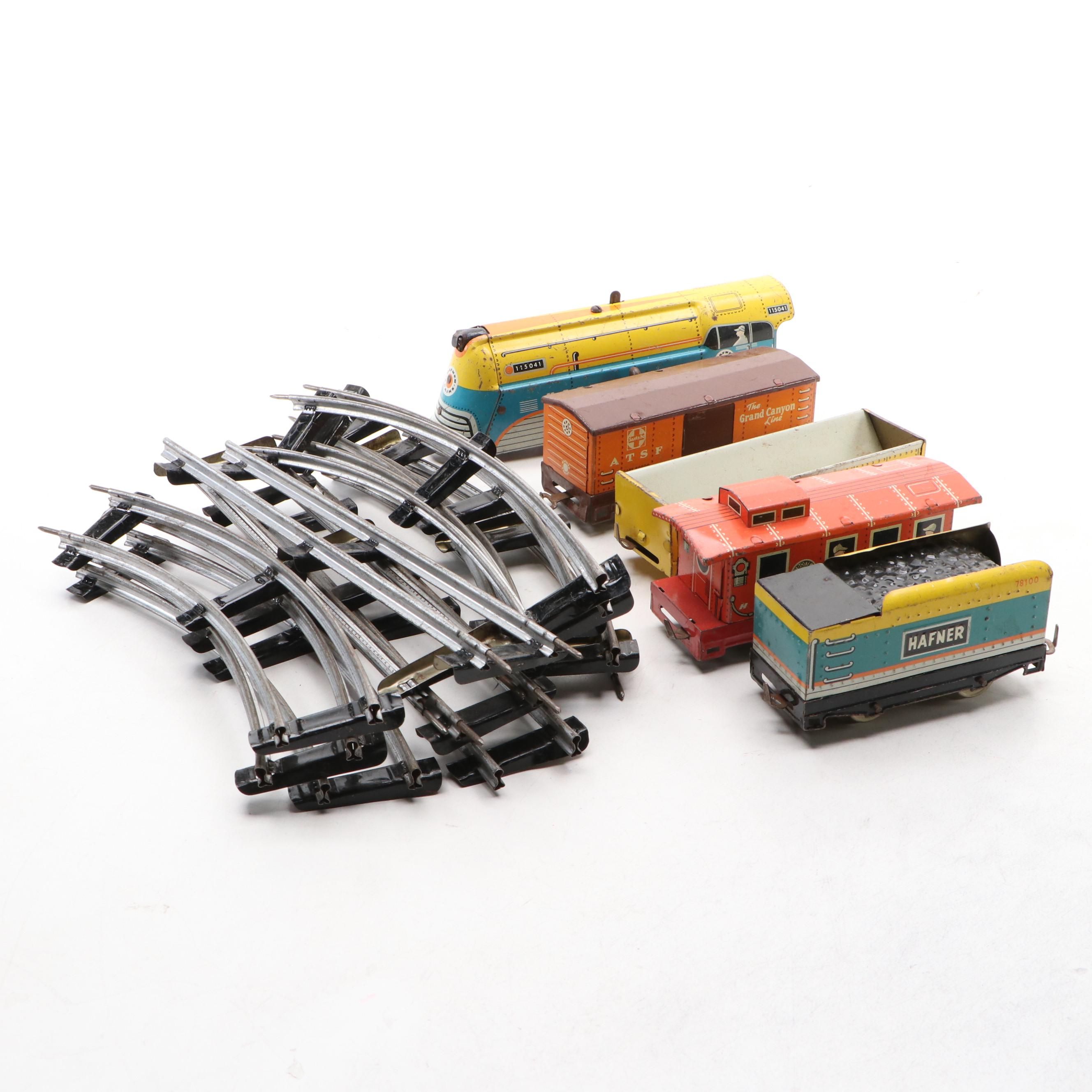 Vintage Hafner Locomotive with Santa Fe Boxcar and Other Tin Litho Train Cars