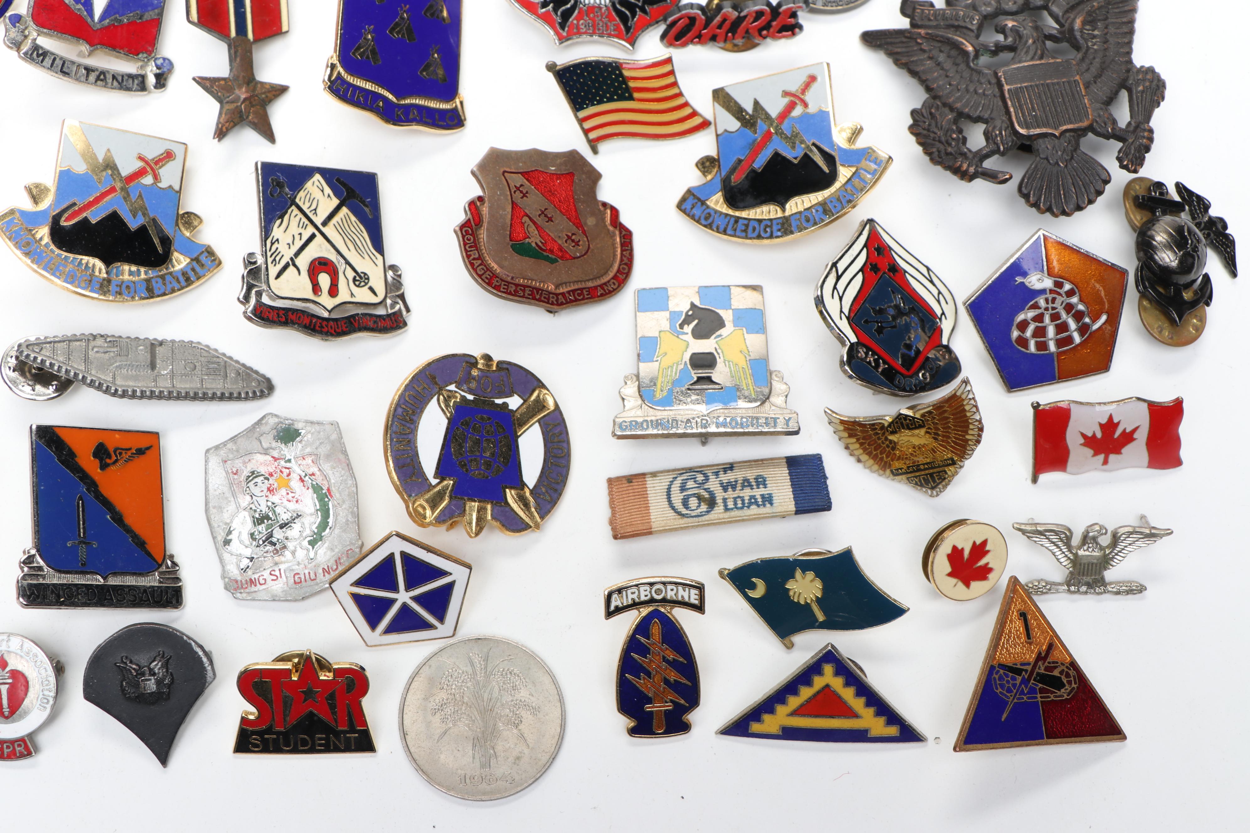 Collection of Enamel Metal Pinbacks and Iron-On Patches