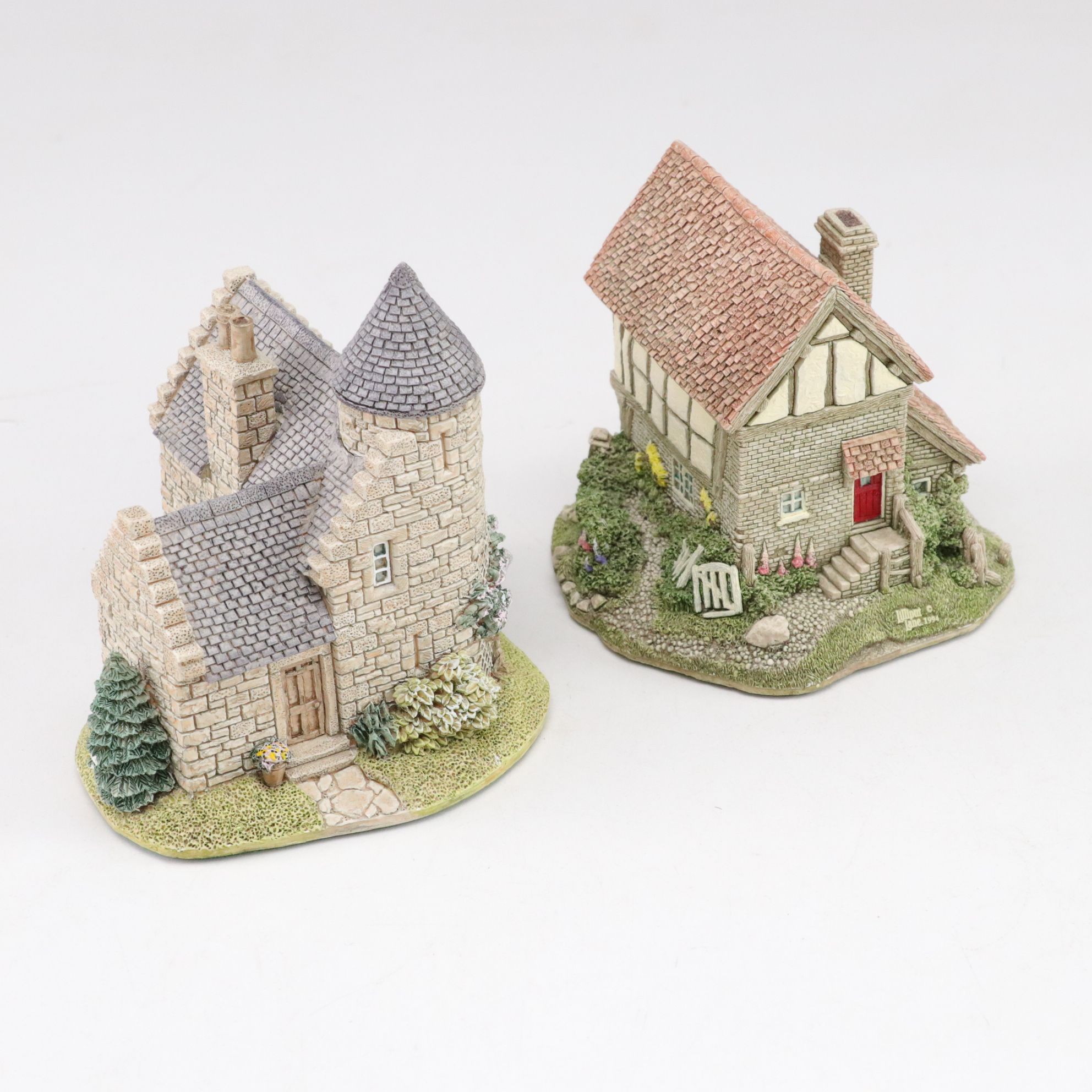 Six Lilliput Lane Buildings with "Ladybank Lodge" and "Tired Timbers" and a Sign