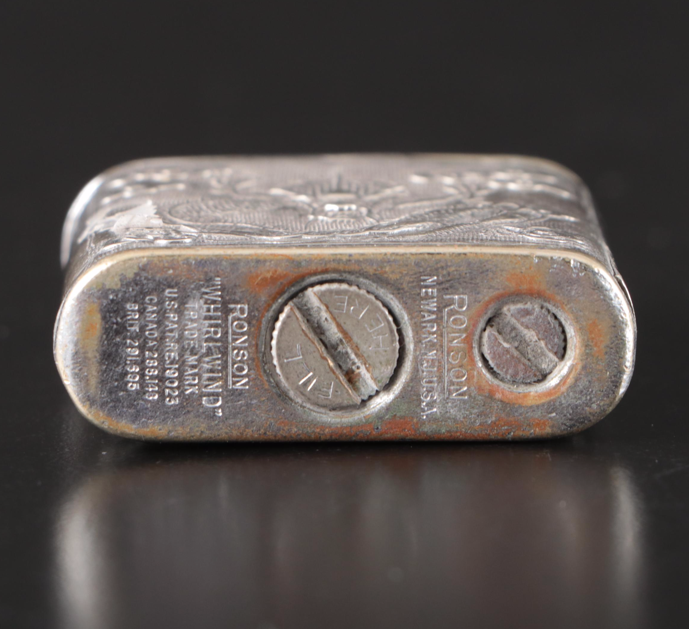 Sterling Silver Southeast Asian Theme and Ronson Dragon Lighters