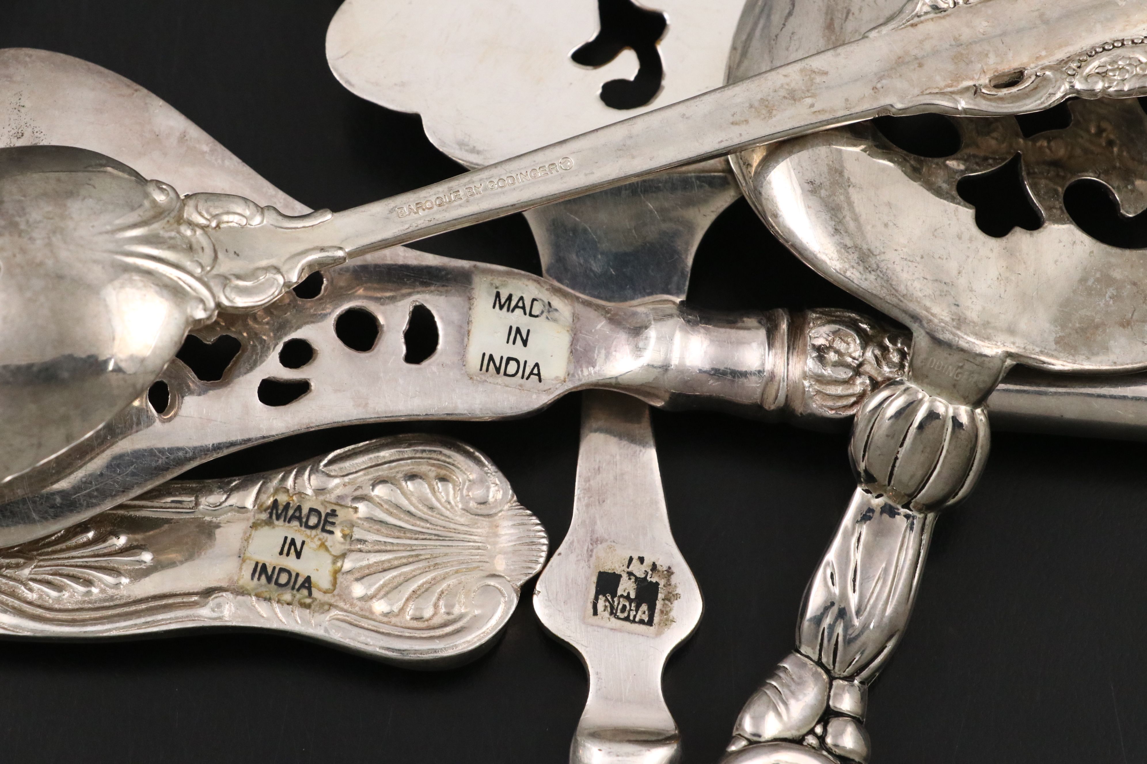Mother-of-Pearl Serving Spoon and Other Ornate Serving Utensils