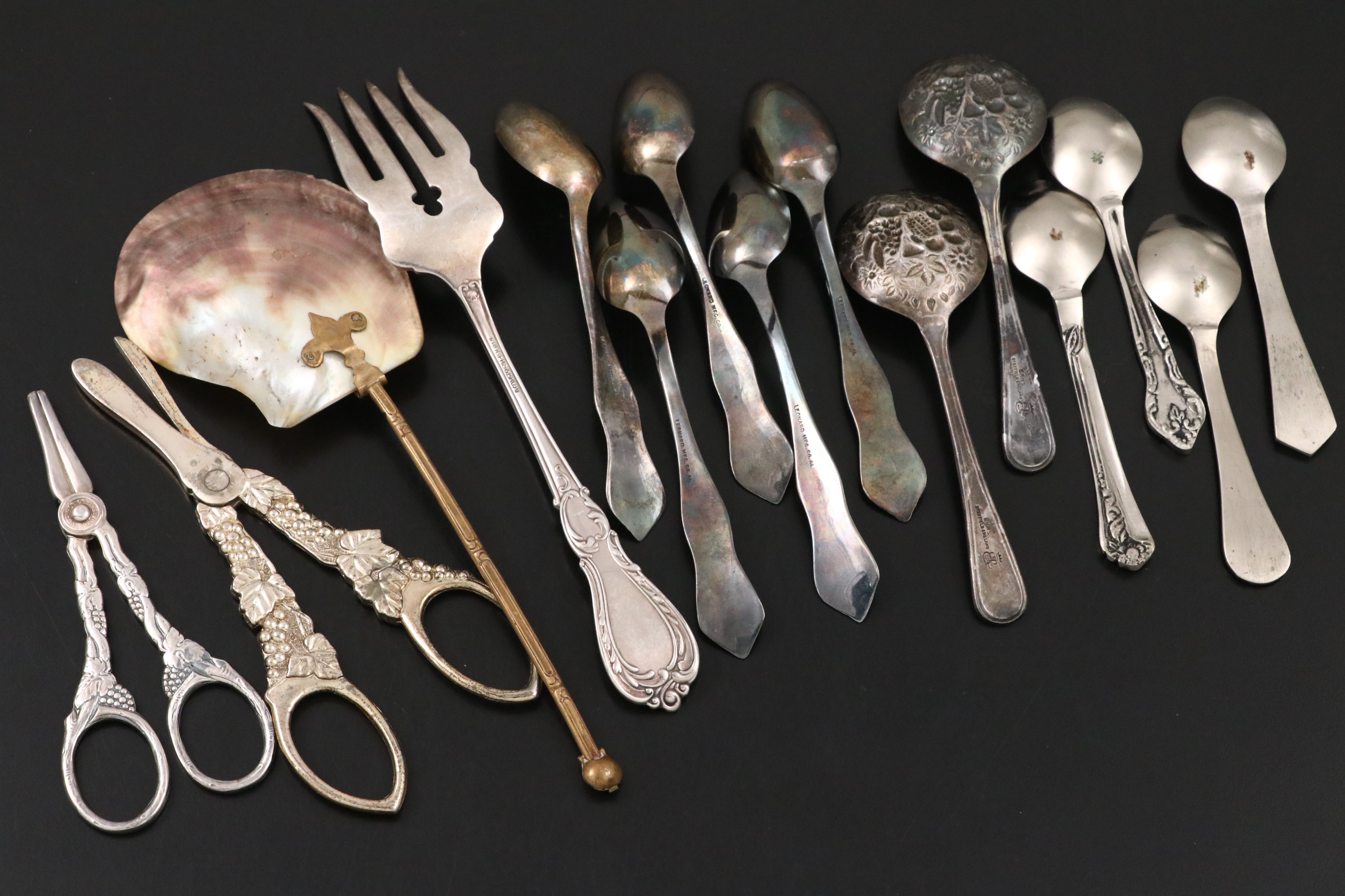 Mother-of-Pearl Serving Spoon and Other Ornate Serving Utensils